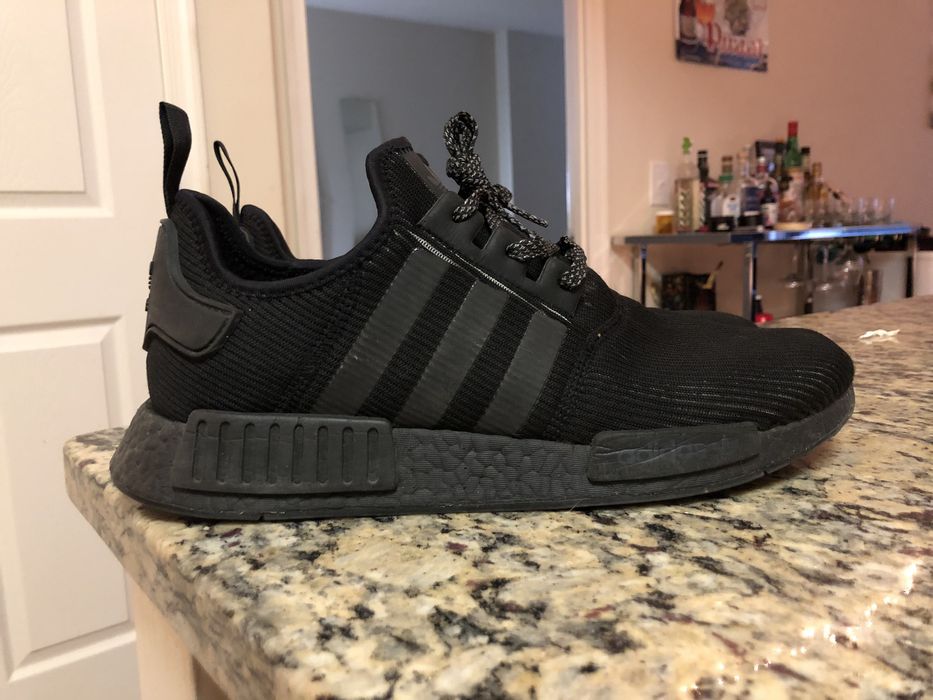 Nmd triple black on sale reflective