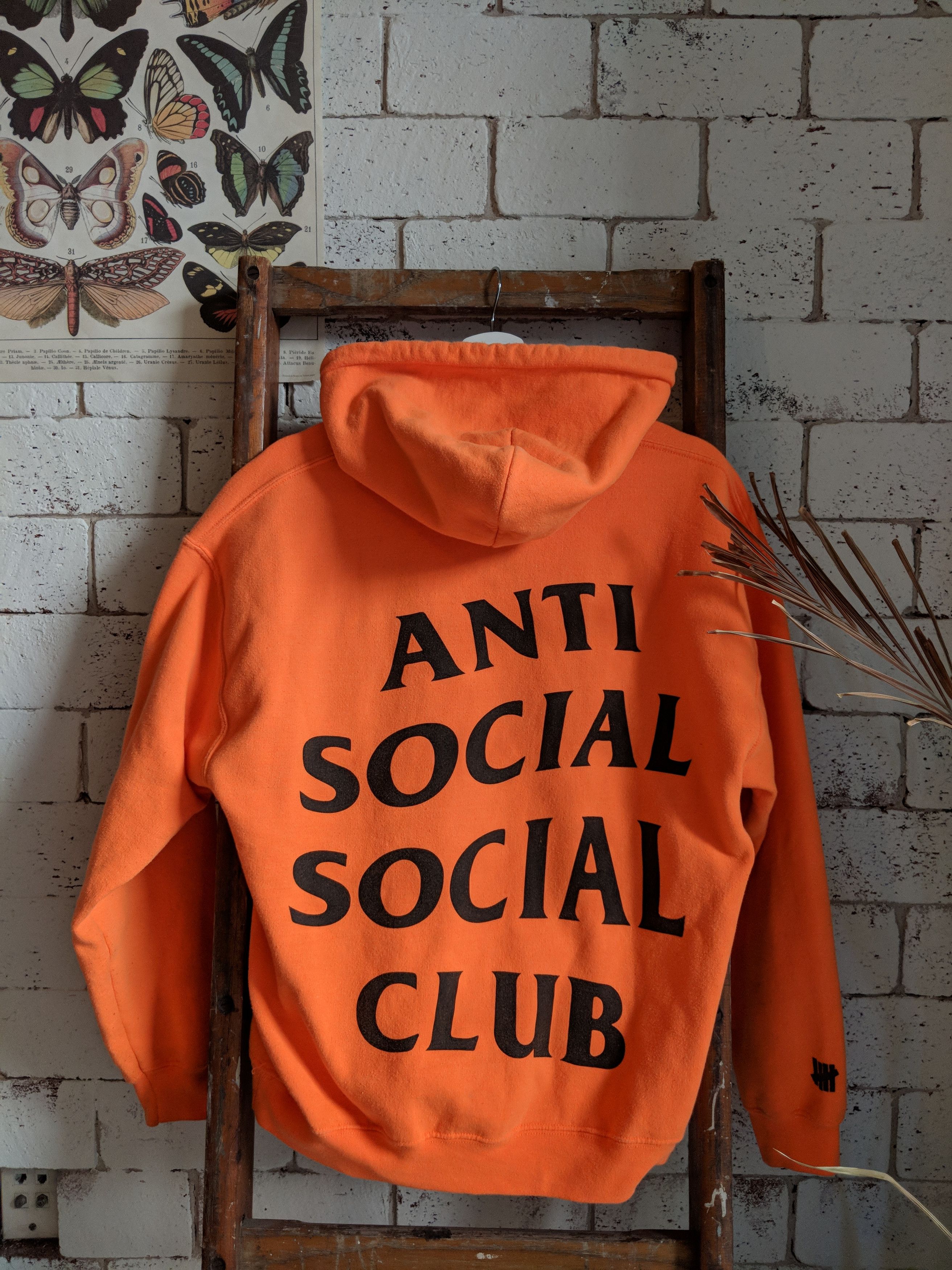 Anti social social club x undefeated paranoid hoodie orange sale