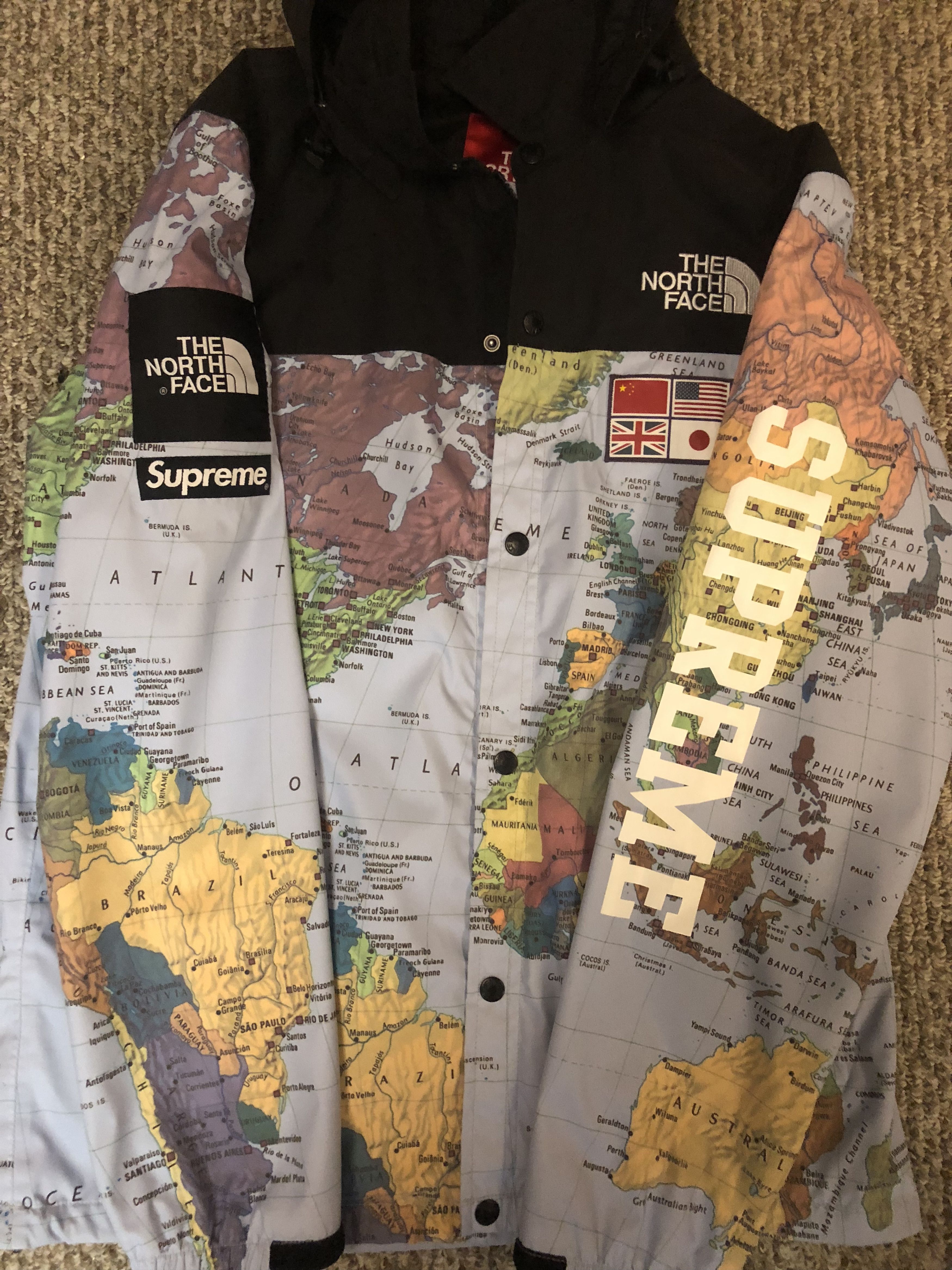 The north face supreme world hot sale map jacket