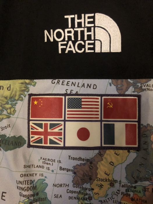 Supreme north face map best sale jacket fake