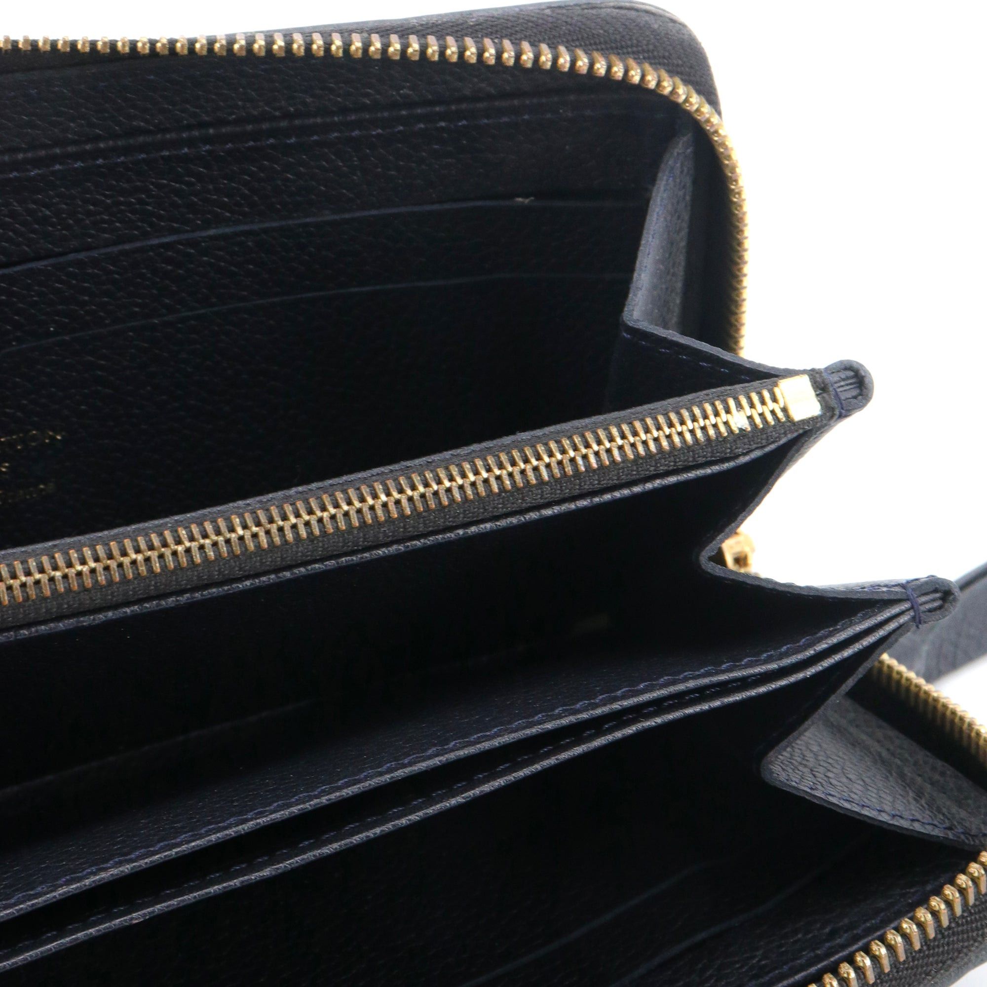 Louis Vuitton LOUIS VUITTON - Louis Vuitton Zippy wallet in navy blue imprint leather Size ONE SIZE - 8 Thumbnail