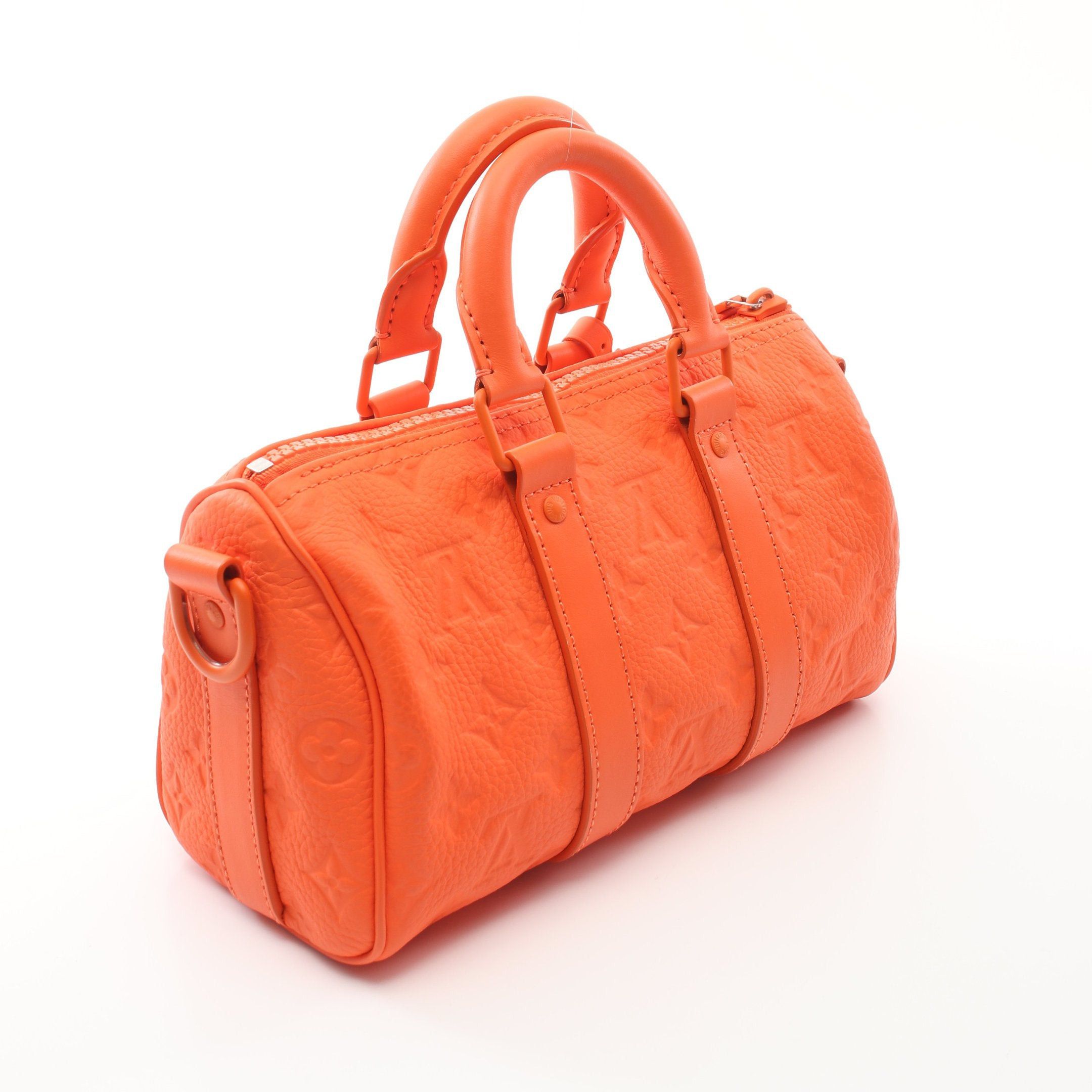 Louis Vuitton Louis Vuitton Keepall 25 Monogram Empreinte Handbag Orange Size ONE SIZE - 2 Thumbnail