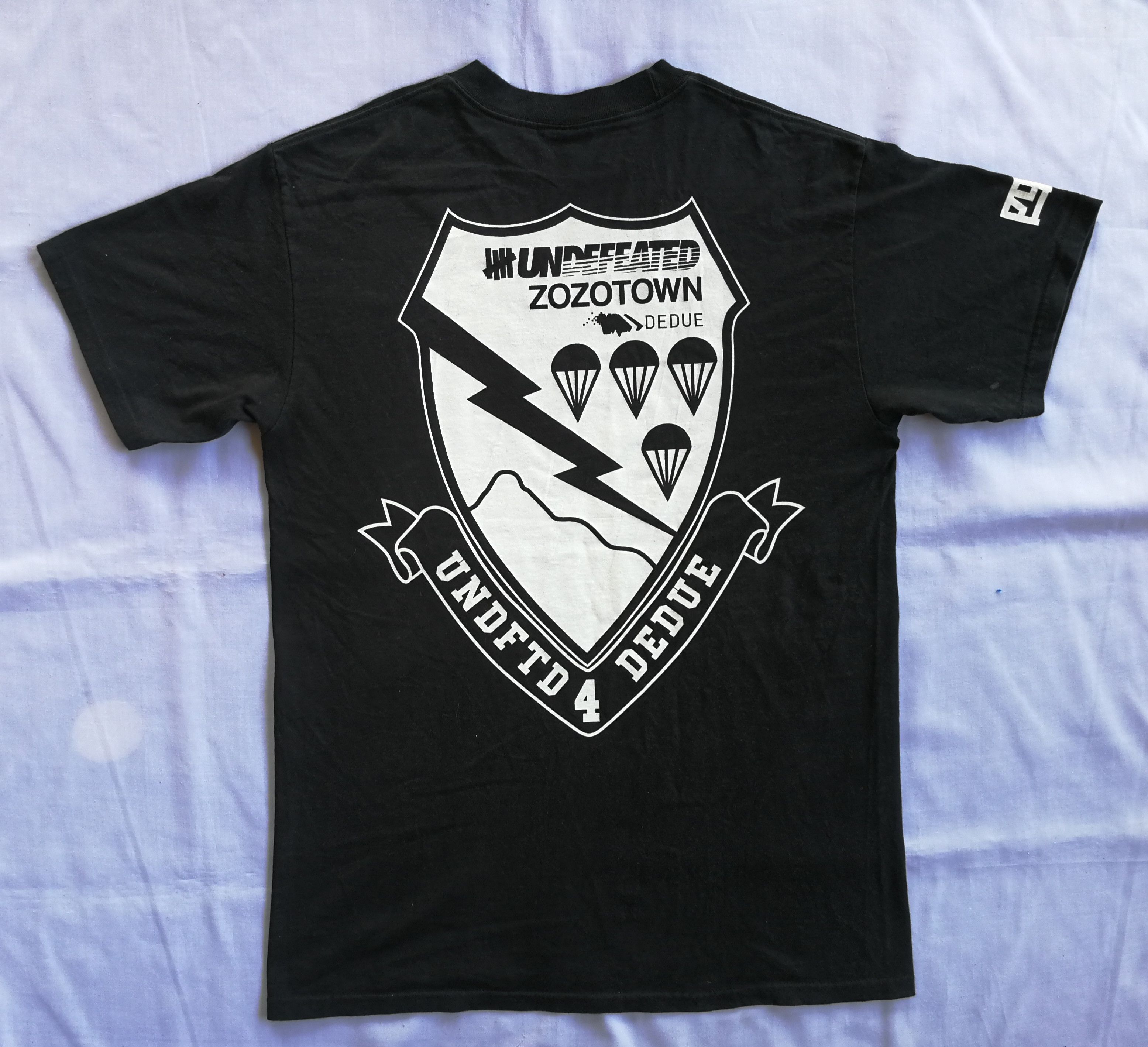 Japanese Brand × Undefeated UNDEFEATED print bothside zozotown Size US M / EU 48-50 / 2 - 6 Thumbnail