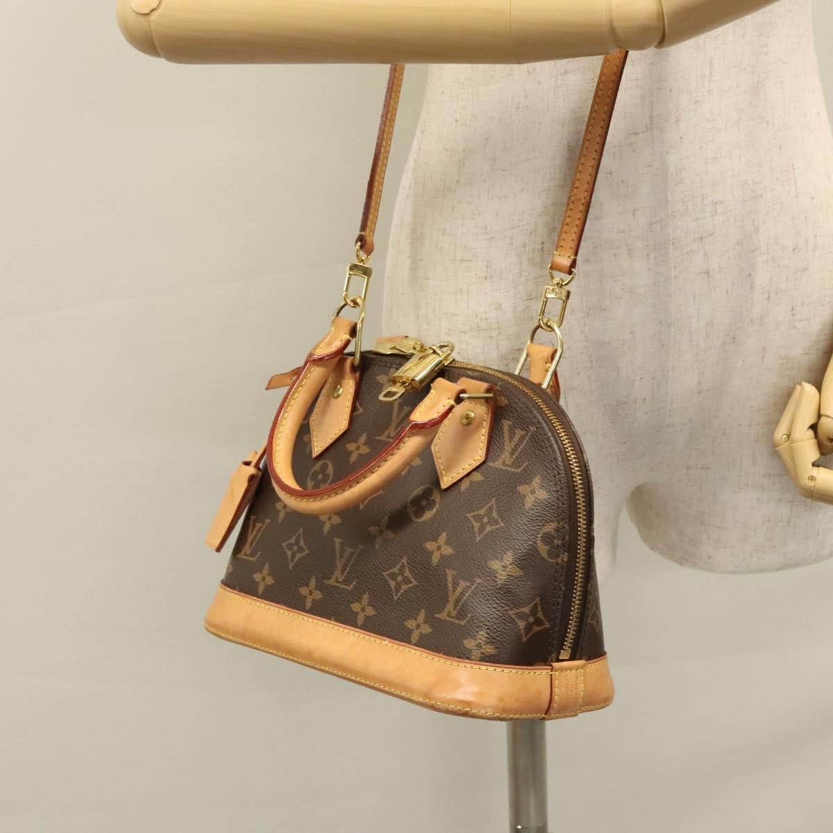 Louis Vuitton Alma Bb Brown Canvas Handbag (Pre-Owned) Size ONE SIZE - 16 Thumbnail