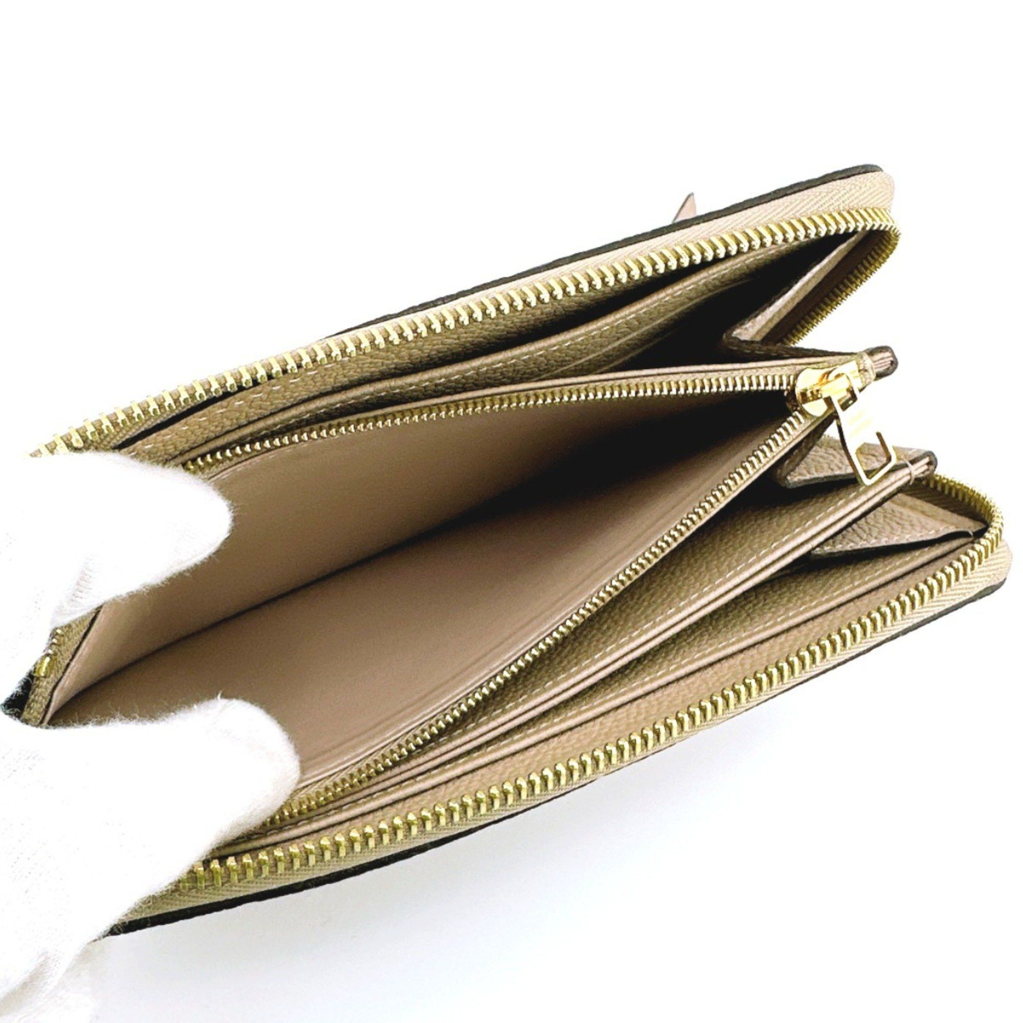 Louis Vuitton Louis Vuitton Long Wallet Round Monogram Zippy Empreinte M60746 Dune LV Size ONE SIZE - 11 Thumbnail