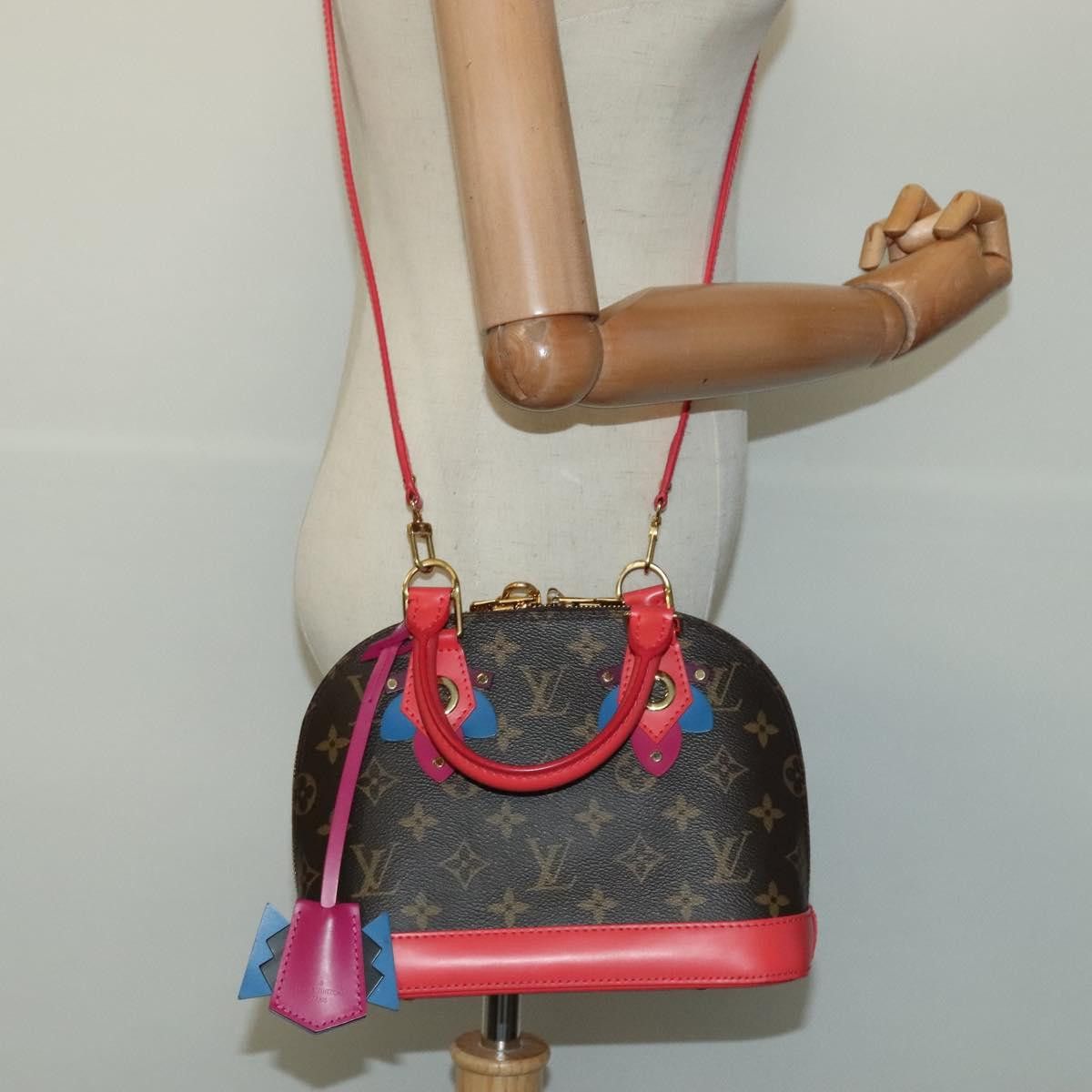 Louis Vuitton Alma Bb Red Canvas Handbag (Pre-Owned) Size ONE SIZE - 18 Thumbnail