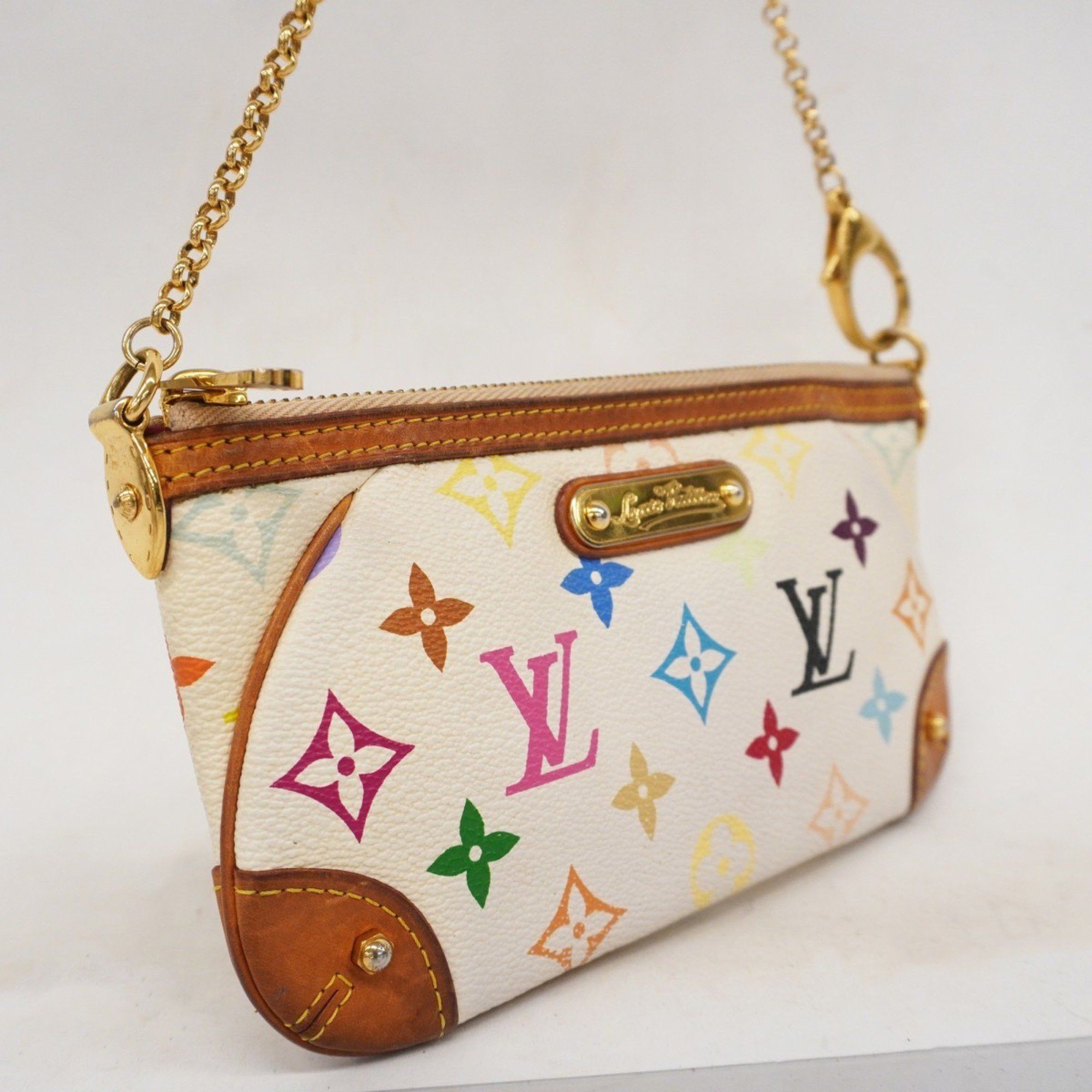 Louis Vuitton Milla clutch