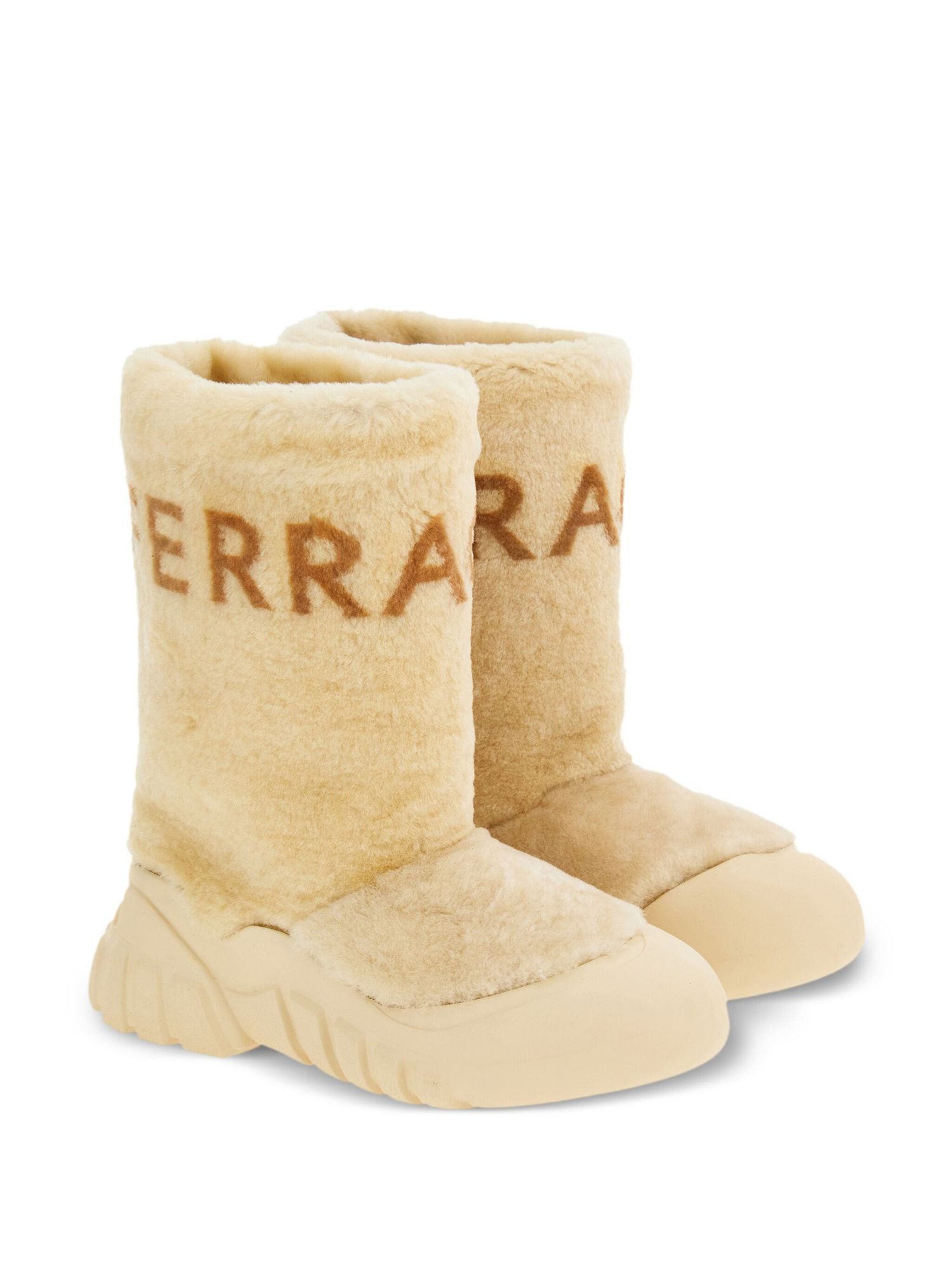 Delphi Shearling logo furry ski boots in beige