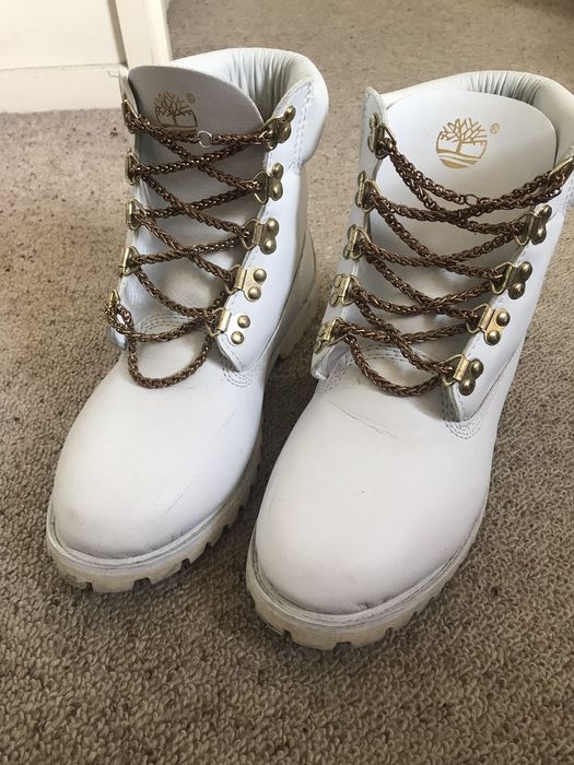 All white timberlands with deals gold chain laces