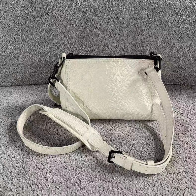 Louis Vuitton Louis Vuitton White Embossed Logo Messenger Bag Size ONE SIZE - 2 Thumbnail