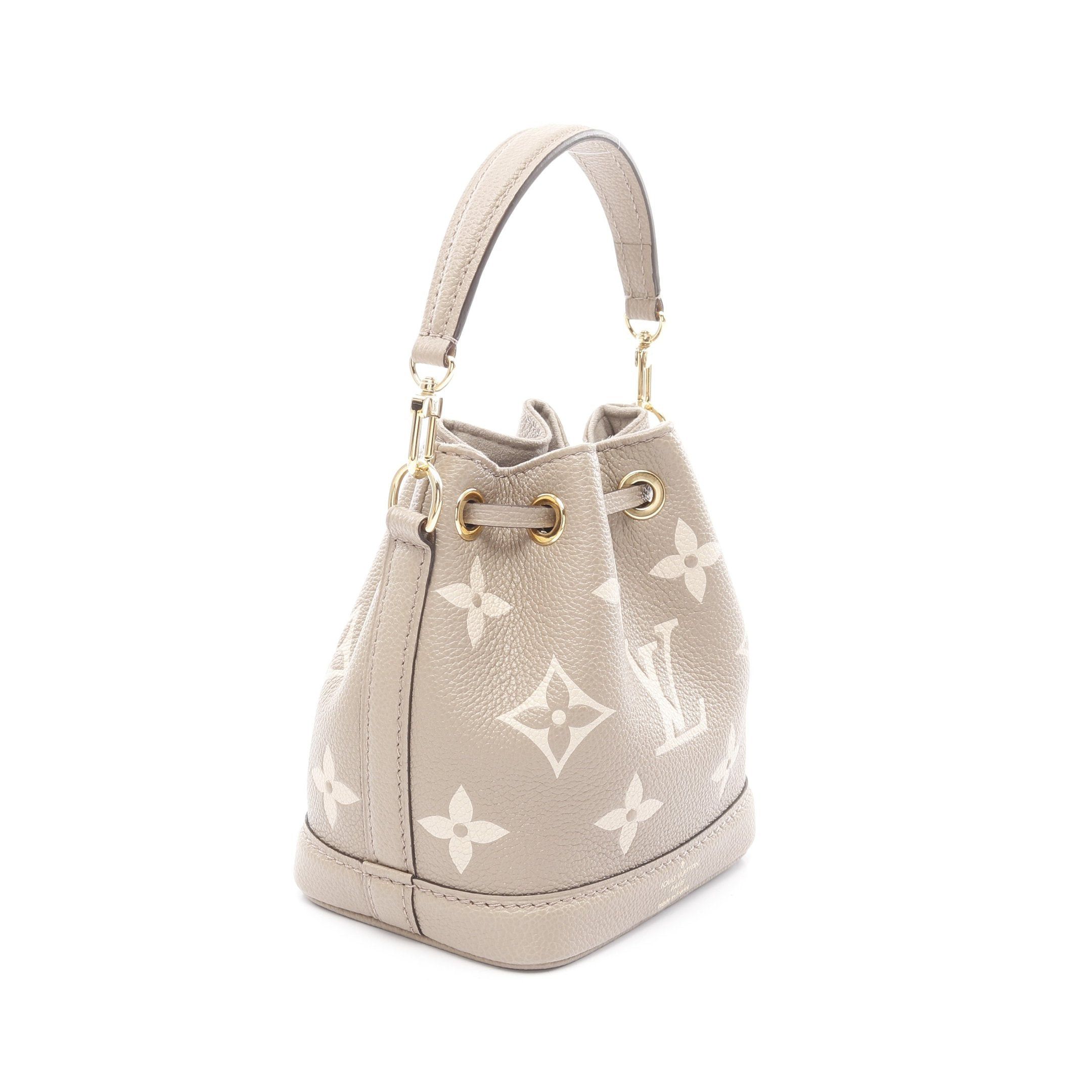 Louis Vuitton Louis Vuitton Nano Noe Bicolor Monogram Empreinte Tourterelle Claim Handbag Leather Gray Beige Ivory Size ONE SIZE - 2 Thumbnail