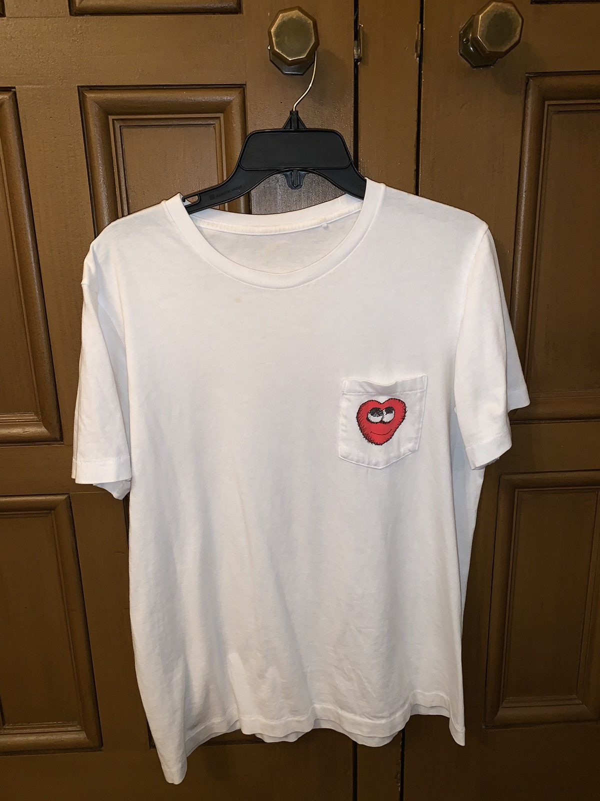 Uniqlo Kaws x Uniqlo Heart Pocket Tee | Grailed