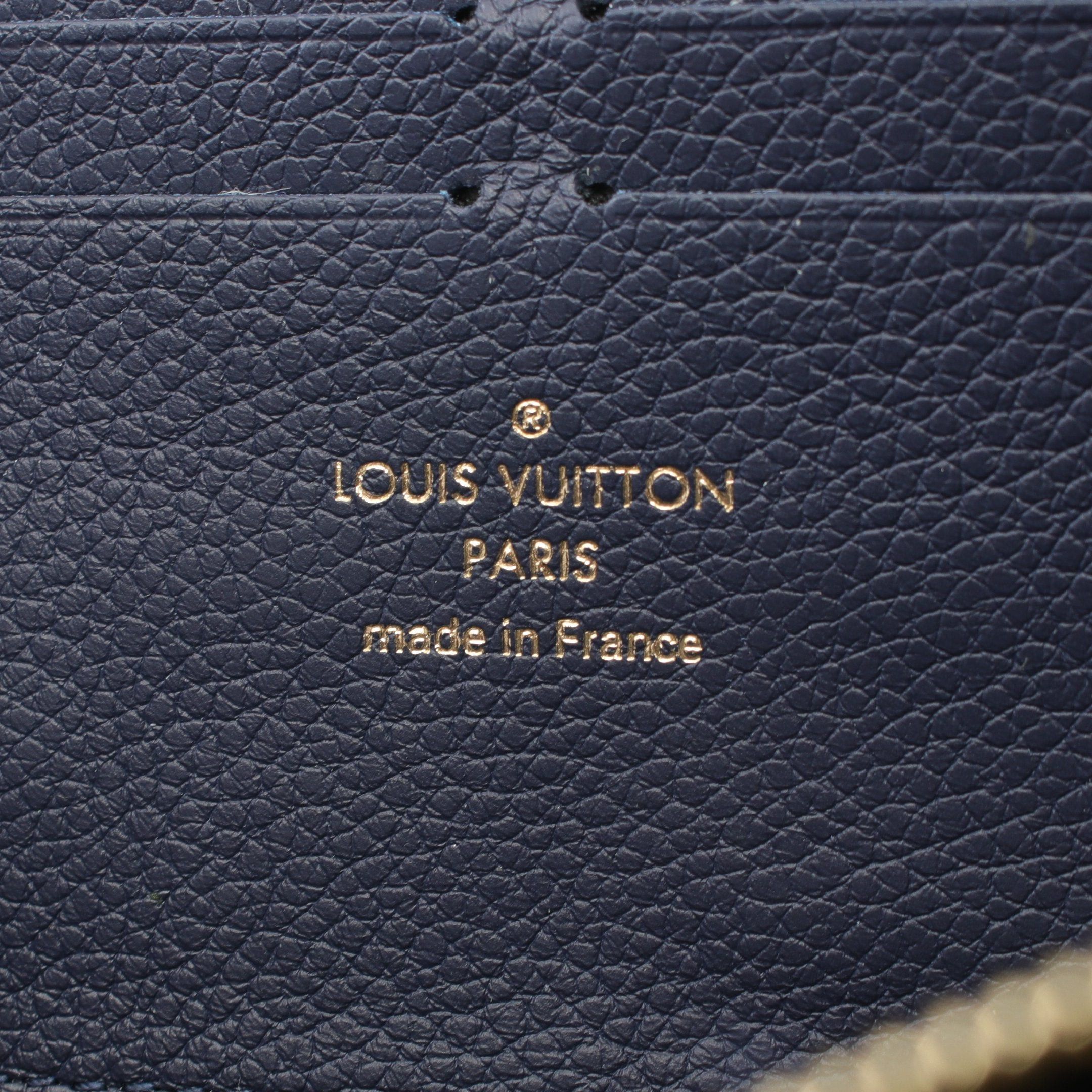 Louis Vuitton Louis Vuitton Portefeuil Clemence Monogram Empreinte Round Zipper Long Wallet Leather Dark Navy Ivory Size ONE SIZE - 7 Thumbnail