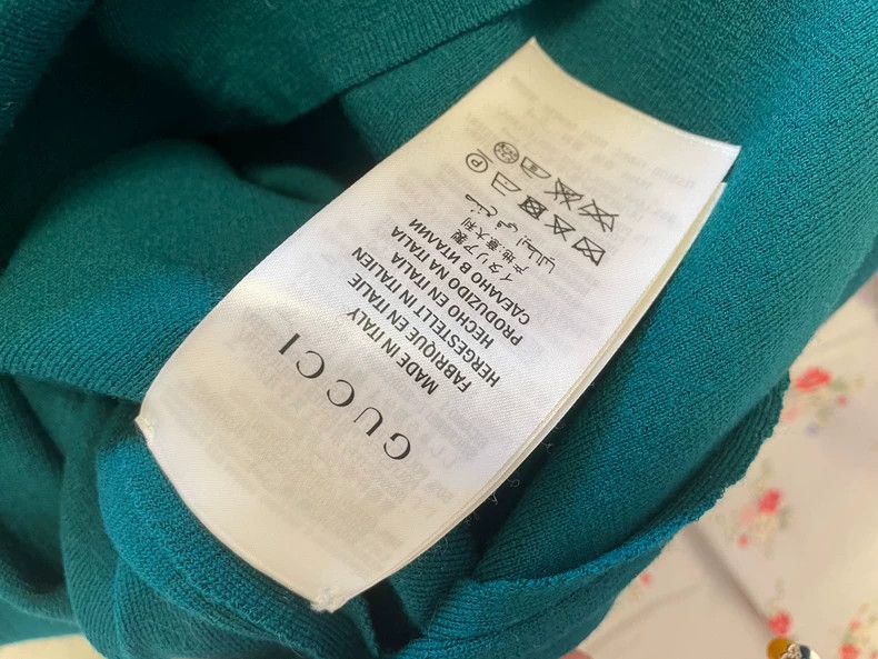 green emerald velvet dress Gucci Emerald Spring 2006 Cross Back Gown – The Kit Vintage main image 1