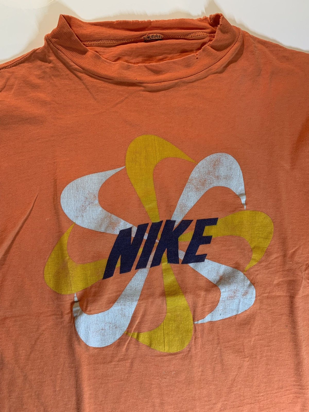 VINTAGE ORIGINAL 1970 s NIKE BLOCK LETTER ORANGE PINWHEEL