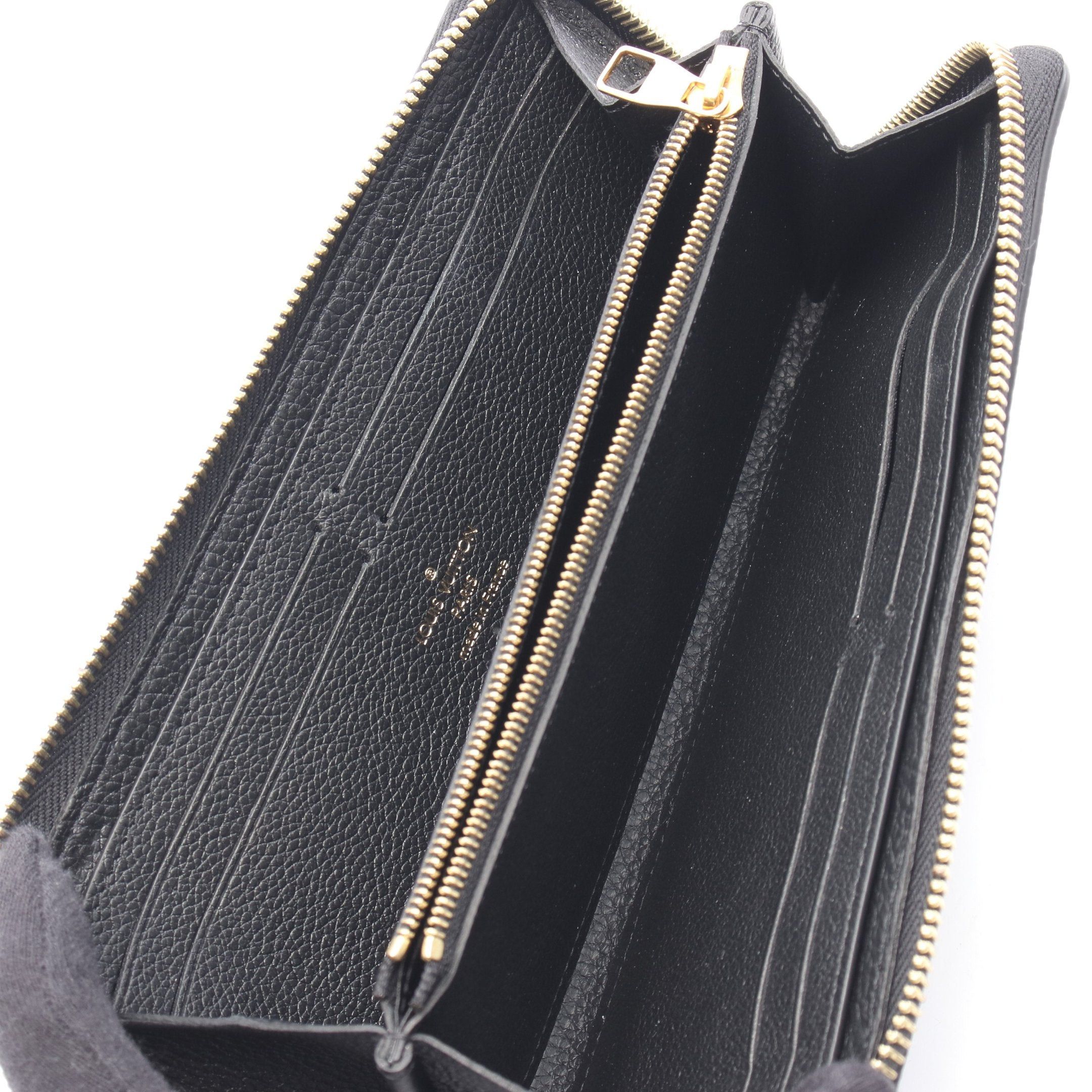 Louis Vuitton Louis Vuitton Portefeuil Clemence Monogram Empreinte Round Zipper Long Wallet Leather Black Ivory Size ONE SIZE - 3 Thumbnail