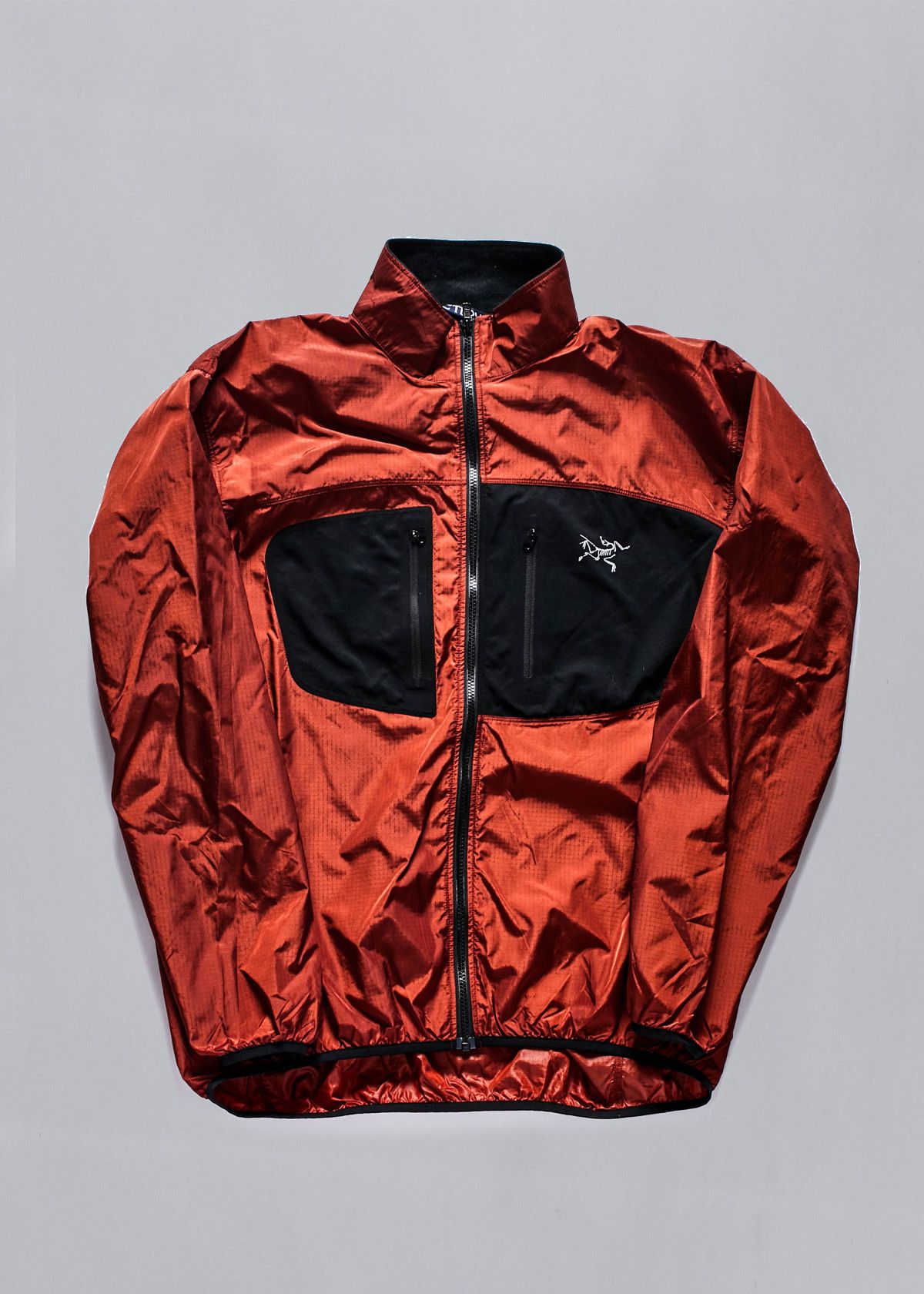 Arc'Teryx TAU LIGHT JACKET ORANGE/BLACK 1990'S - X-LARGE | Grailed