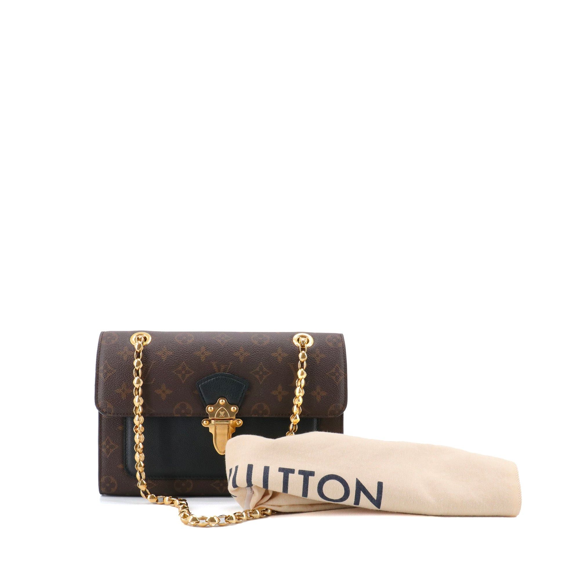 LOUIS VUITTON - Louis Vuitton Victoire shoulder bag in monogrammed canvas and black leather