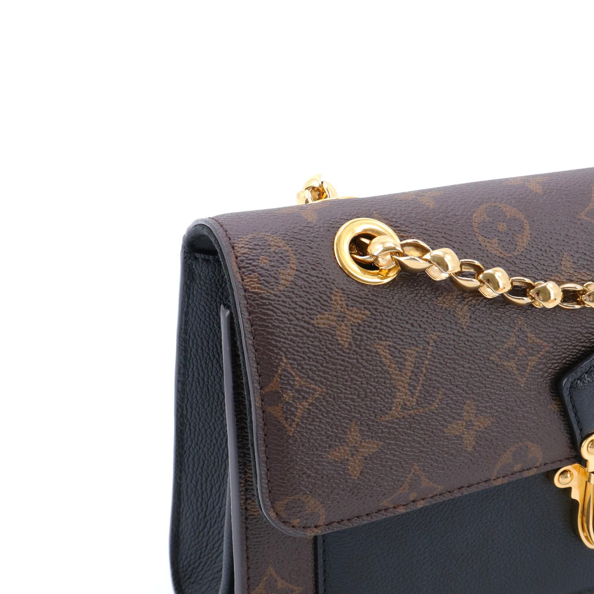 LOUIS VUITTON - Louis Vuitton Victoire shoulder bag in monogrammed canvas and black leather