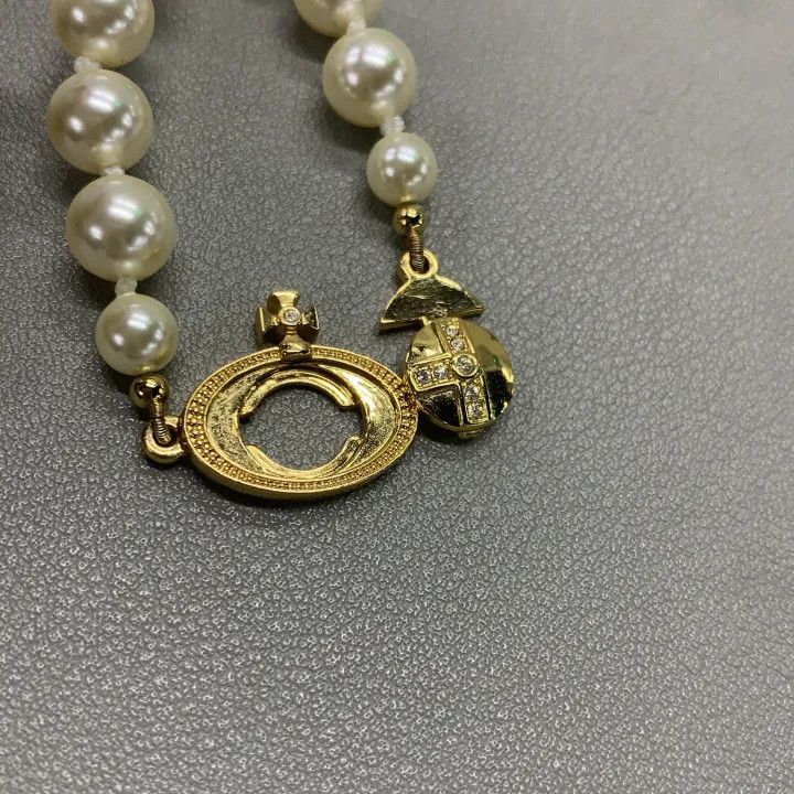 Vivienne Westwood Vivienne Westwood Saturn Pearl Pendant Necklace 0079 Size ONE SIZE - 7 Thumbnail