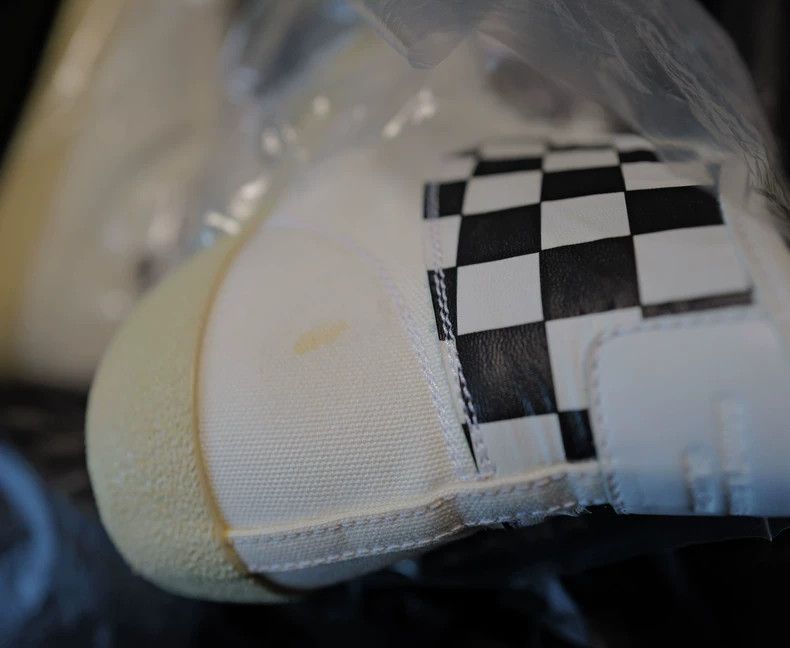 saint laurent surf sneaker with checkerboard design