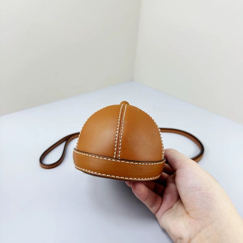 JW Anderson cap-shaped crossbody bag