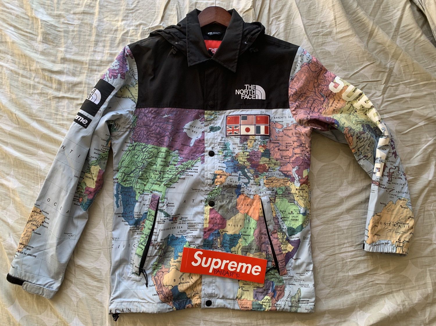 The north face on sale jacket world map