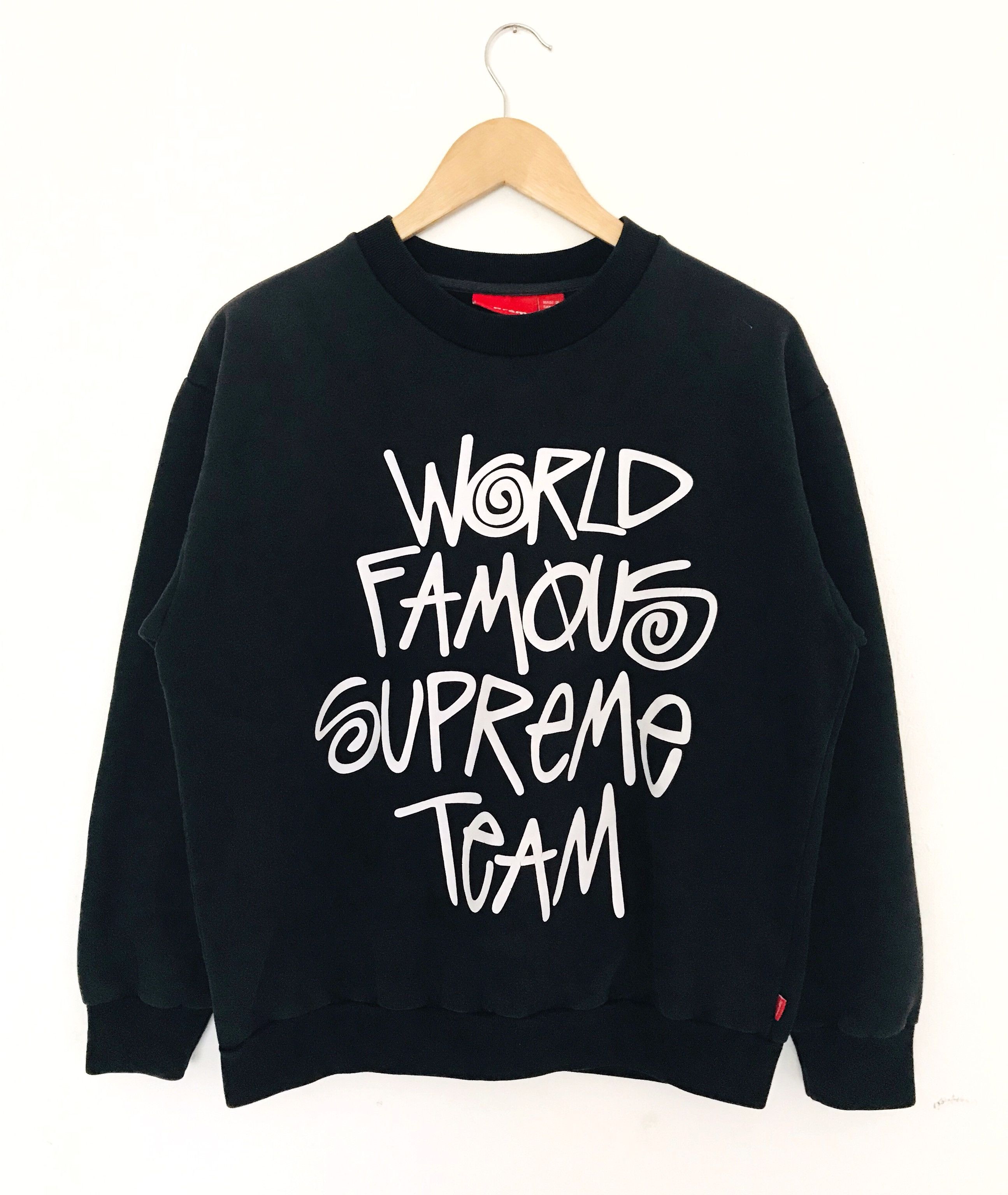 Supreme world best sale famous crewneck