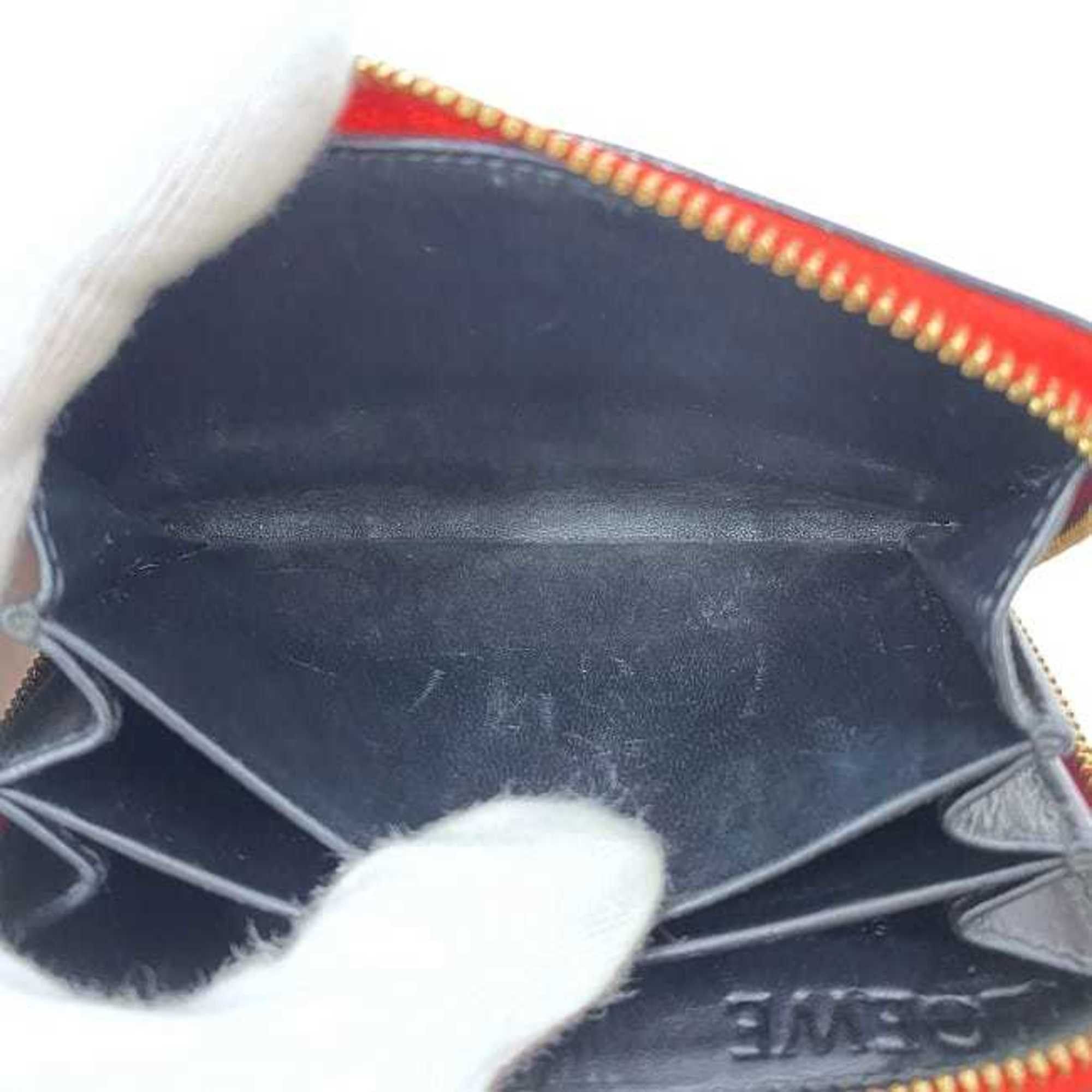 Loewe Loewe coin case ec-23812 in red with a repeat anagram pattern on leather (product number 061609). This compact zip-around wallet is perfect for men and women. Engraved. Size ONE SIZE - 7 Thumbnail