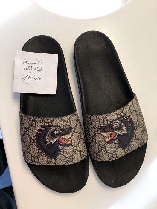 Gucci flip cheap flops wolf