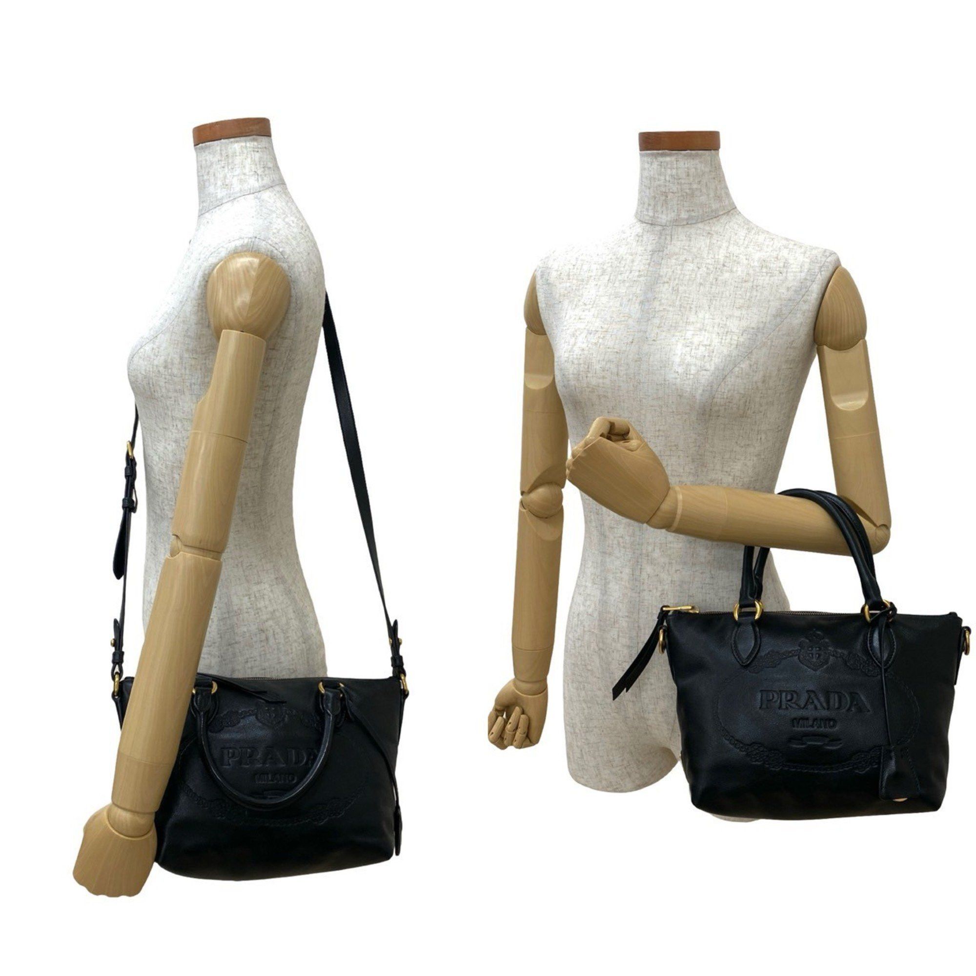 Prada Logo Embossed Calfskin Leather 2-Way Handbag, Mini Boston