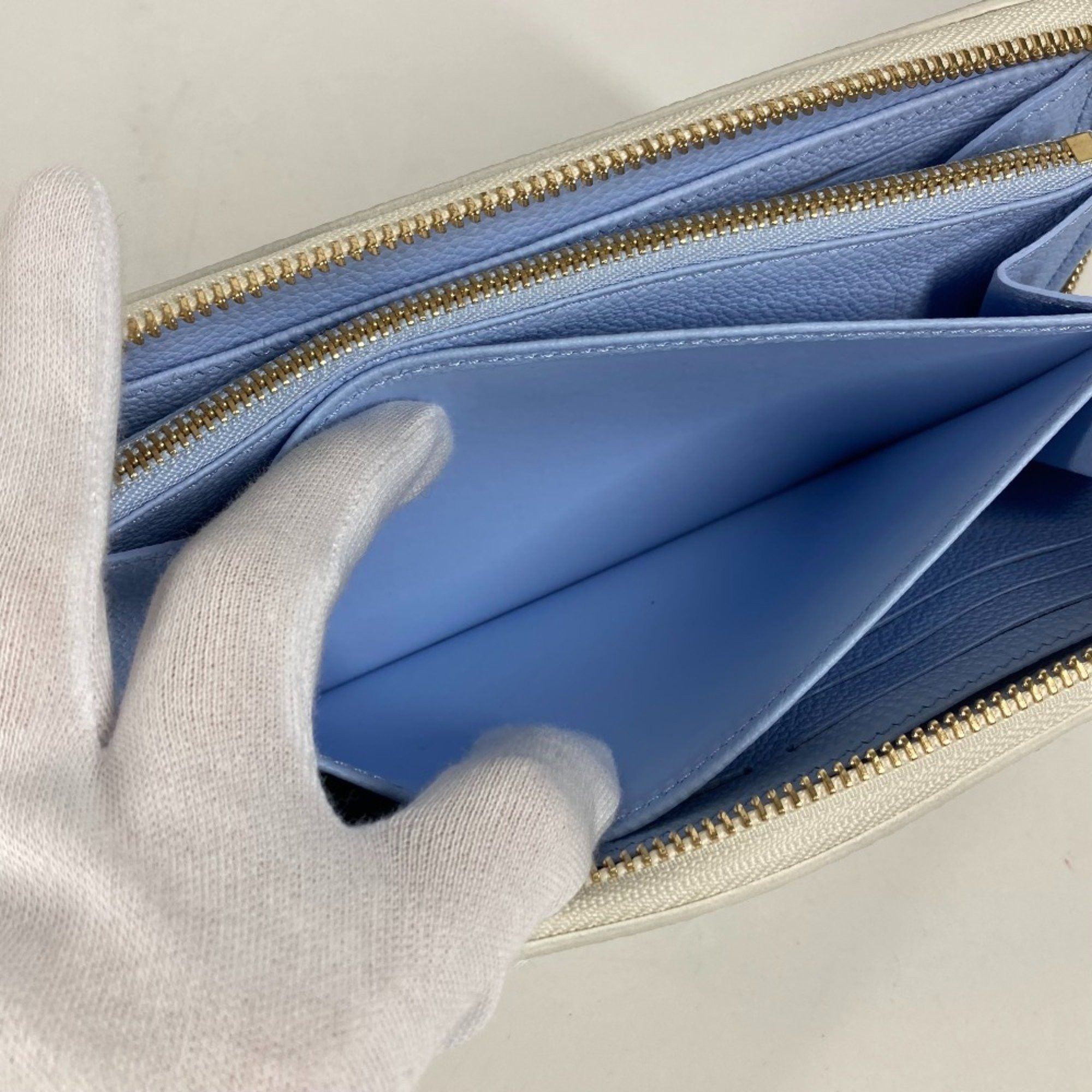 Louis Vuitton LOUIS VUITTON M83308 Monogram Empreinte Zippy Wallet, Round Zipper Long Leather, Women's, Latte White/Candy Blue Size ONE SIZE - 14 Thumbnail