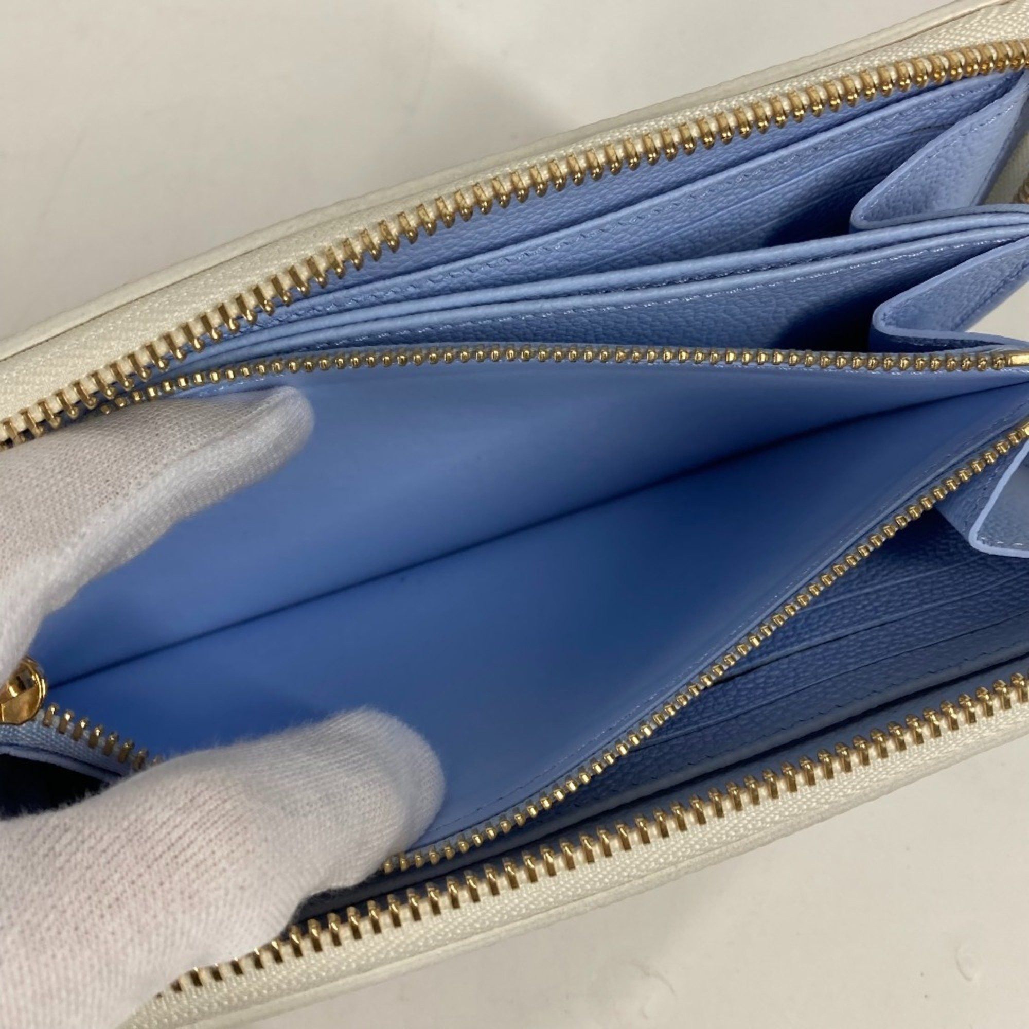 Louis Vuitton LOUIS VUITTON M83308 Monogram Empreinte Zippy Wallet, Round Zipper Long Leather, Women's, Latte White/Candy Blue Size ONE SIZE - 9 Thumbnail
