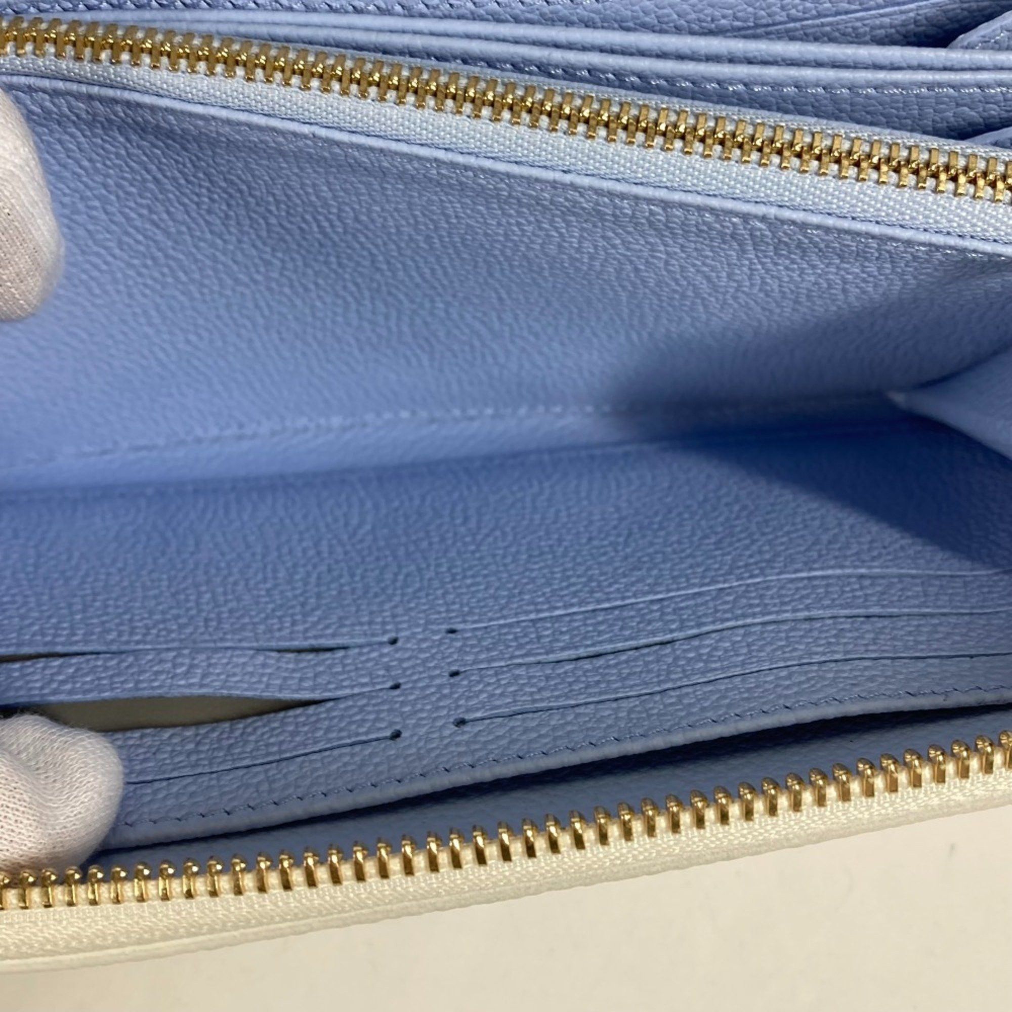 Louis Vuitton LOUIS VUITTON M83308 Monogram Empreinte Zippy Wallet, Round Zipper Long Leather, Women's, Latte White/Candy Blue Size ONE SIZE - 11 Thumbnail