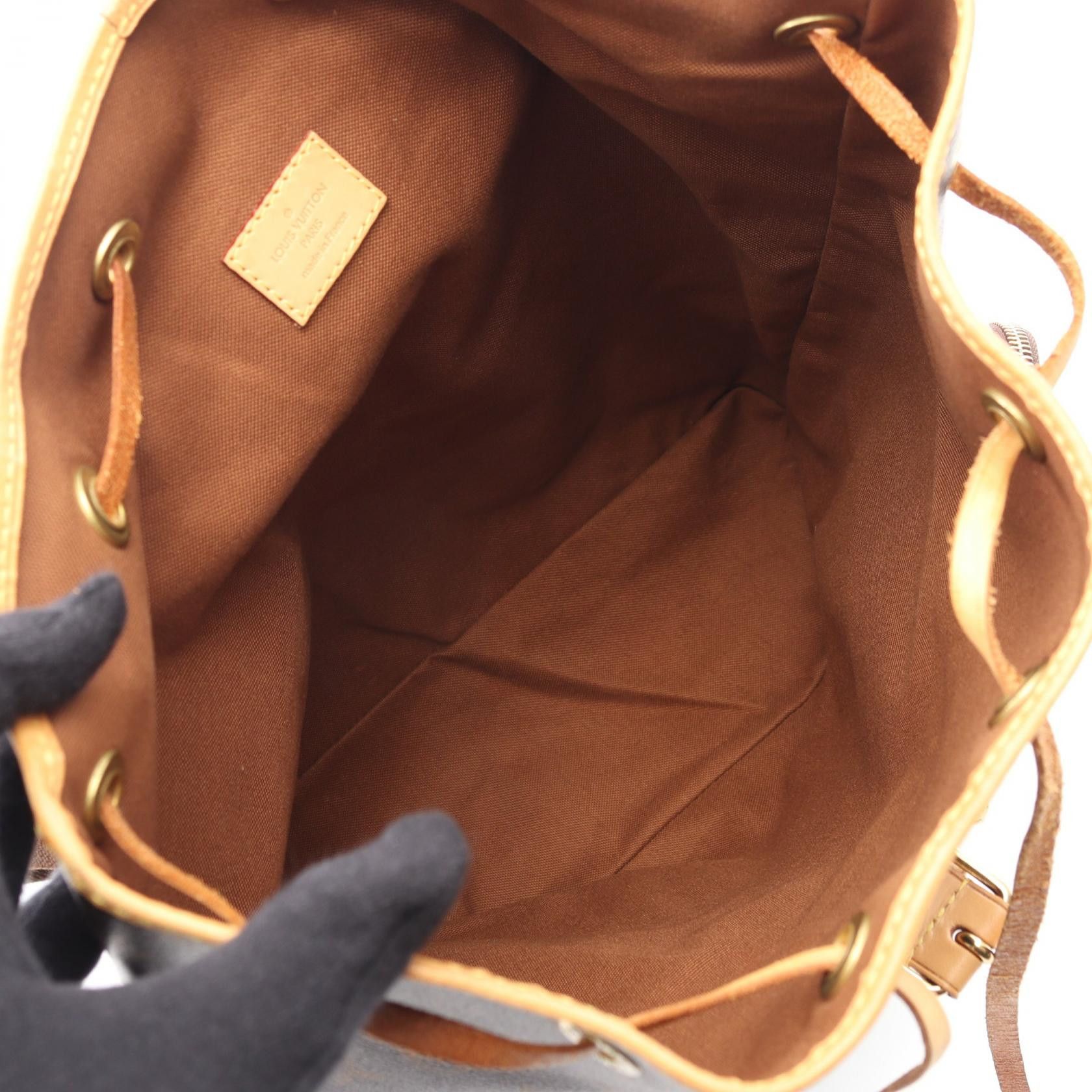 louis vuitton backpack 2014 Pre Loved Monogram Sac A Dos Bosphore and a drawstring closure Monogram M40107 Monogram Backpack Louis