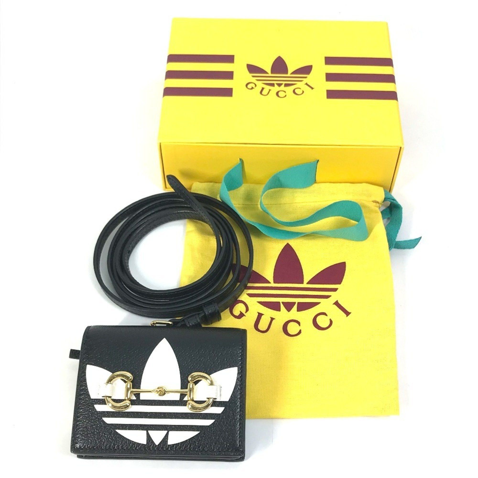 Gucci GUCCI 702248 logo adidas collaboration shoulder wallet/pochette/bifold wallet in black leather for women Size ONE SIZE - 16 Thumbnail