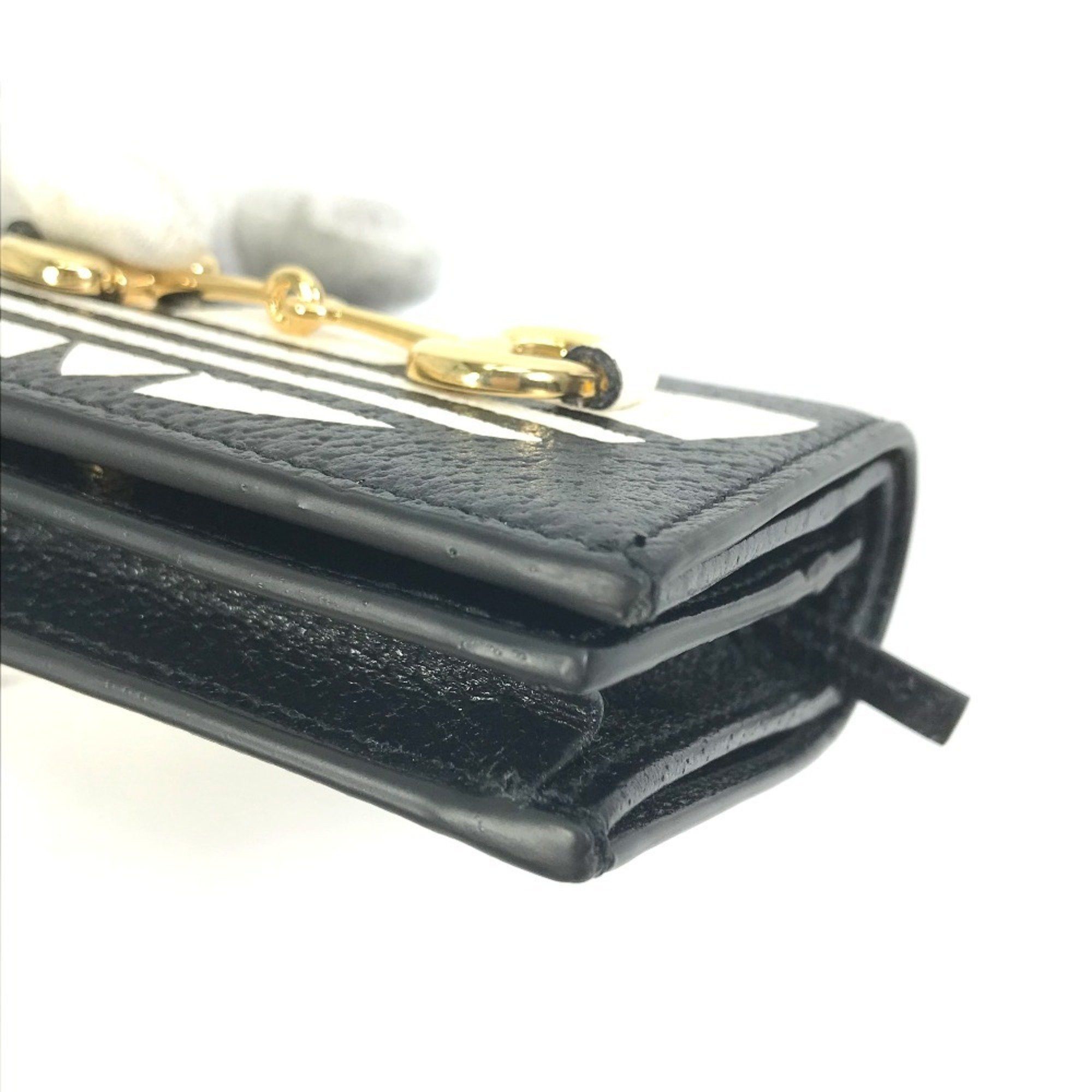 Gucci GUCCI 702248 logo adidas collaboration shoulder wallet/pochette/bifold wallet in black leather for women Size ONE SIZE - 10 Thumbnail