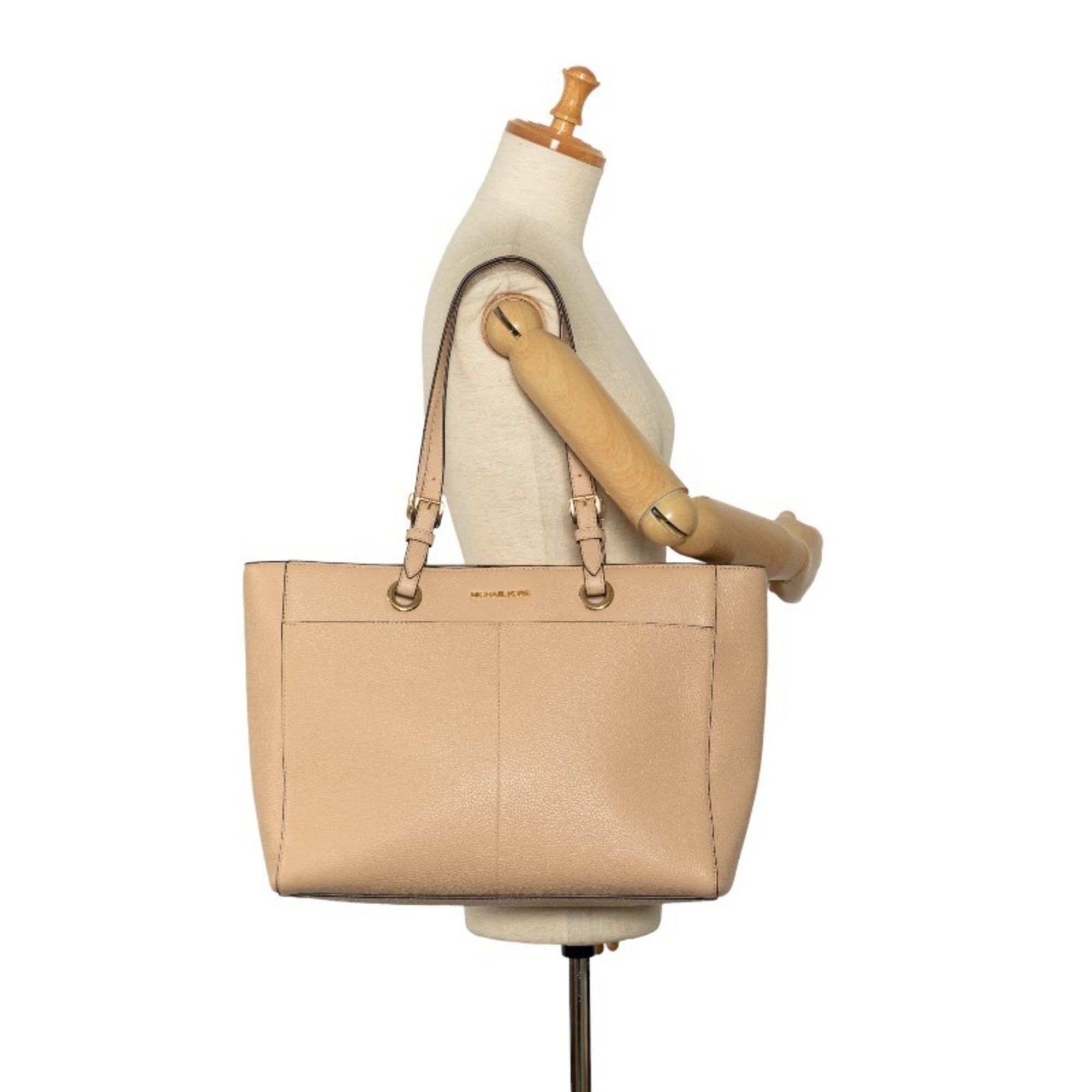 Michael Kors Michael Kors Jet Set Travel logo shoulder bag tote in beige leather for women. Size ONE SIZE - 9 Thumbnail