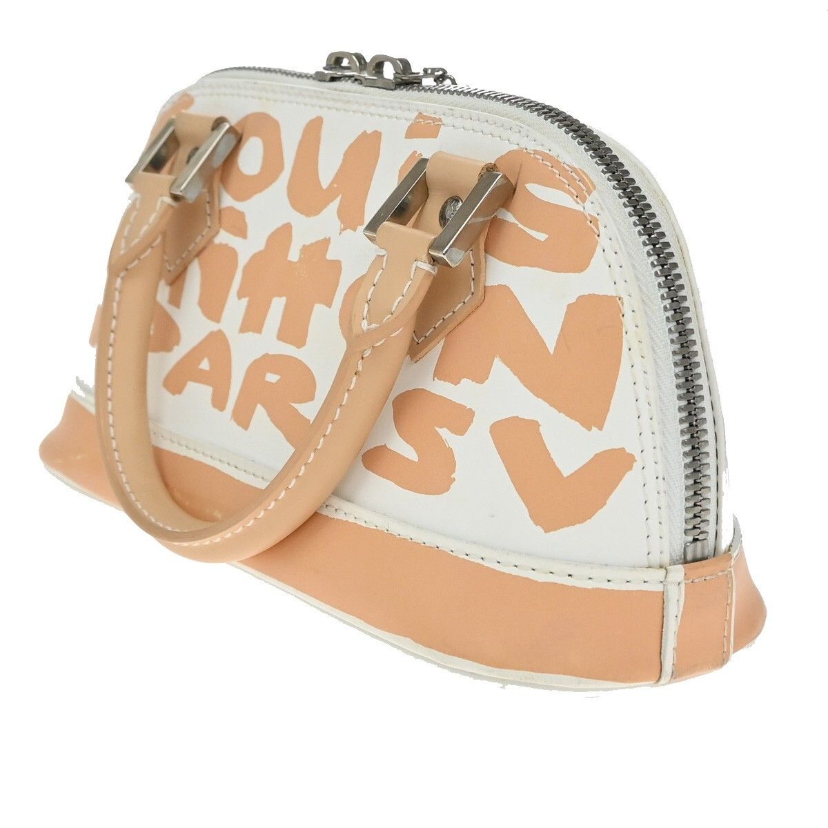 Louis Vuitton Louis Vuitton Alma Handbag Limited Edition Graffiti Leather Size ONE SIZE - 4 Thumbnail
