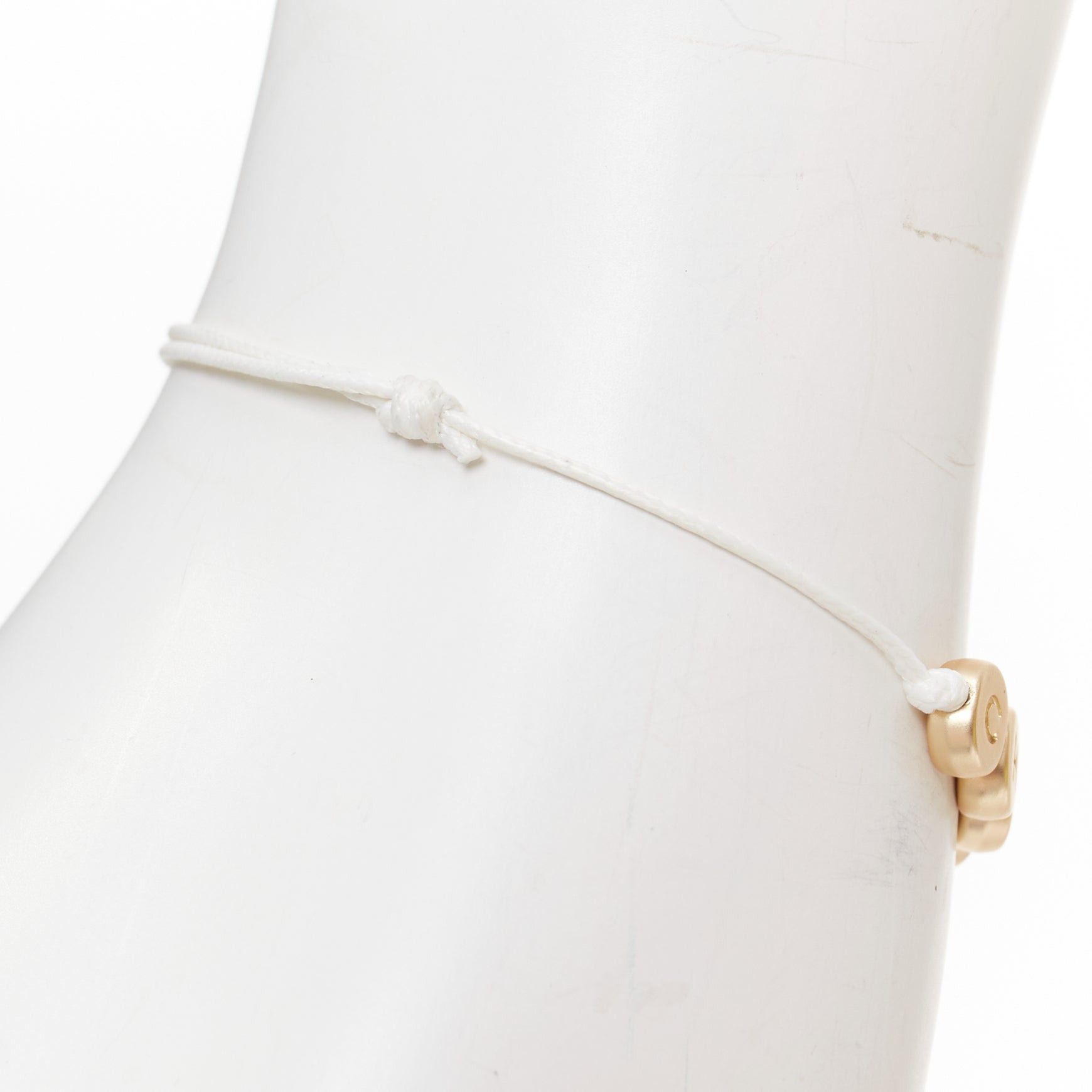 Chanel CHANEL white gold tone logo letter bead charm white thread lucky bracelet Size ONE SIZE - 4 Thumbnail