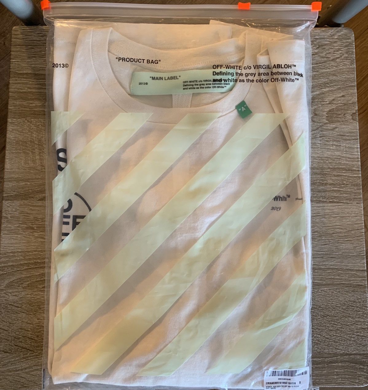 Off white color arrow tee online