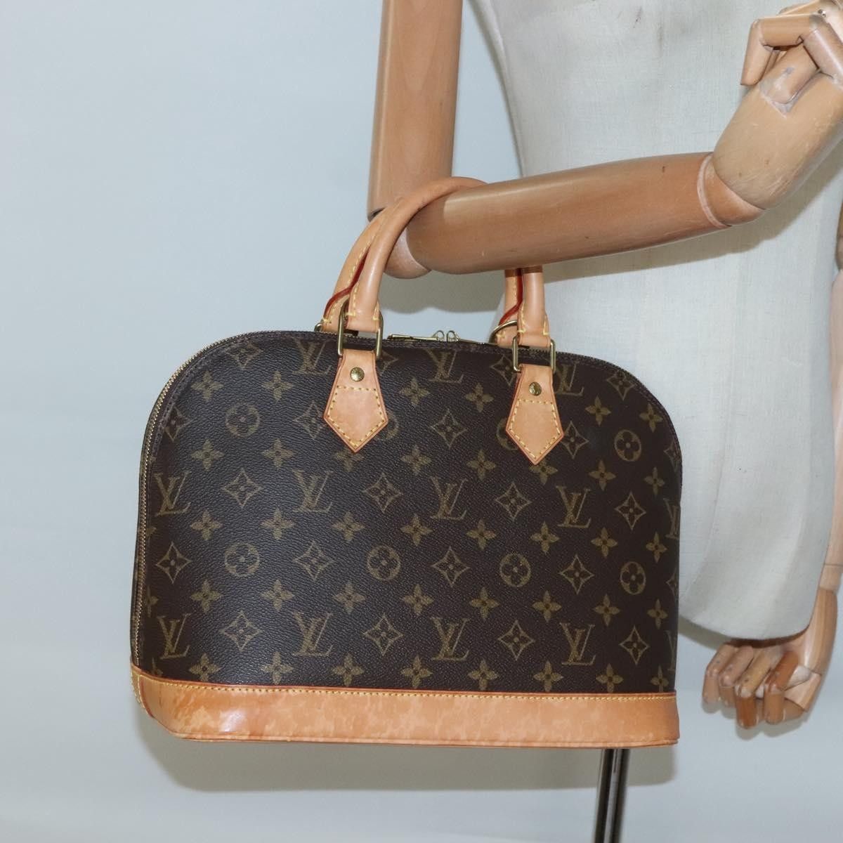 Louis Vuitton Louis Vuitton Alma Handbag Monogram Canvas Size ONE SIZE - 14 Thumbnail