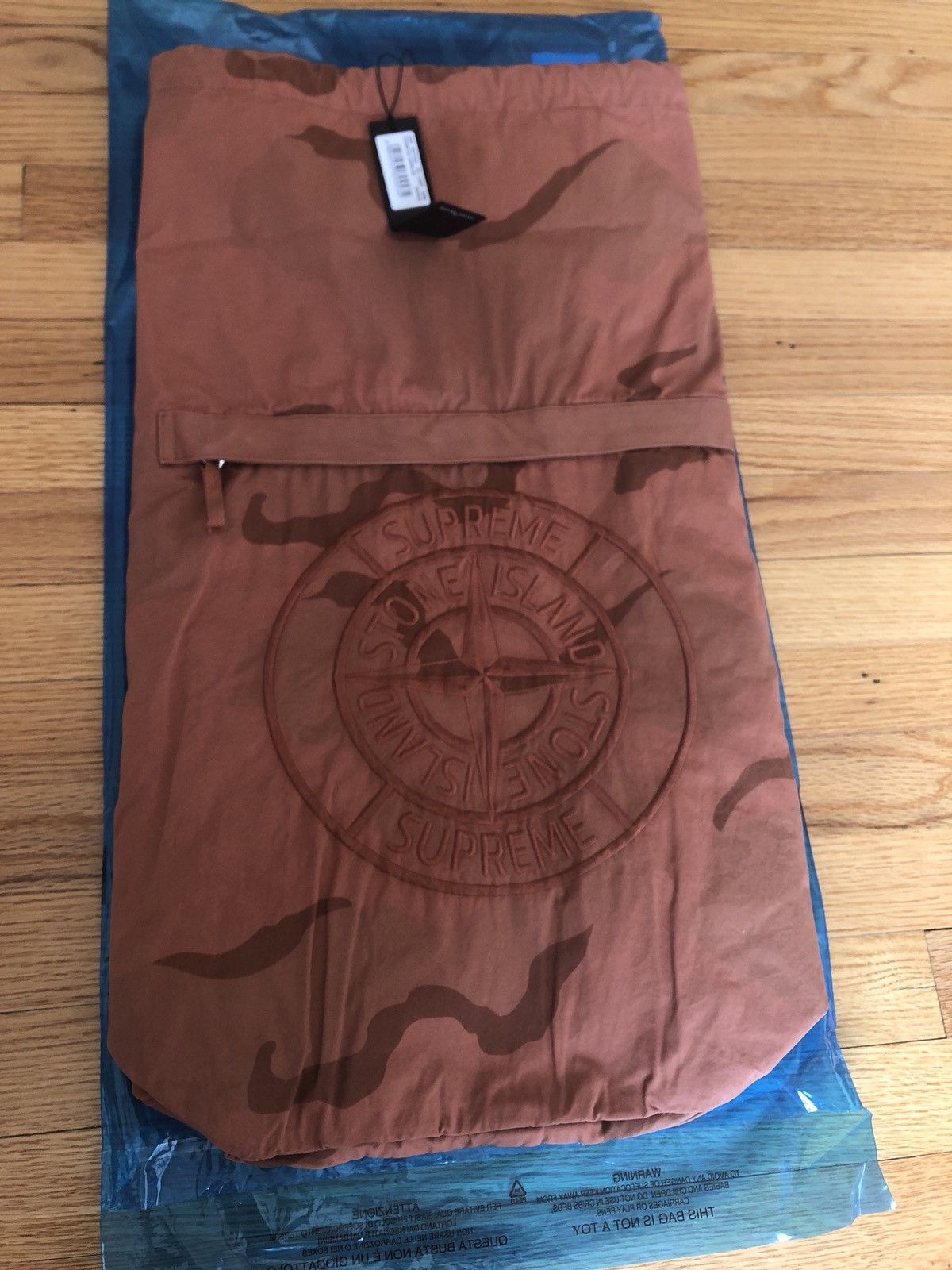 Supreme stone island camo backpack hotsell