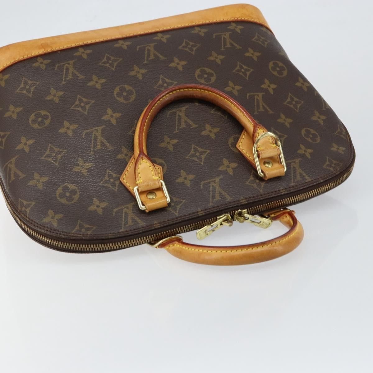 Louis Vuitton Louis Vuitton Alma Handbag Monogram Canvas Size ONE SIZE - 16 Thumbnail