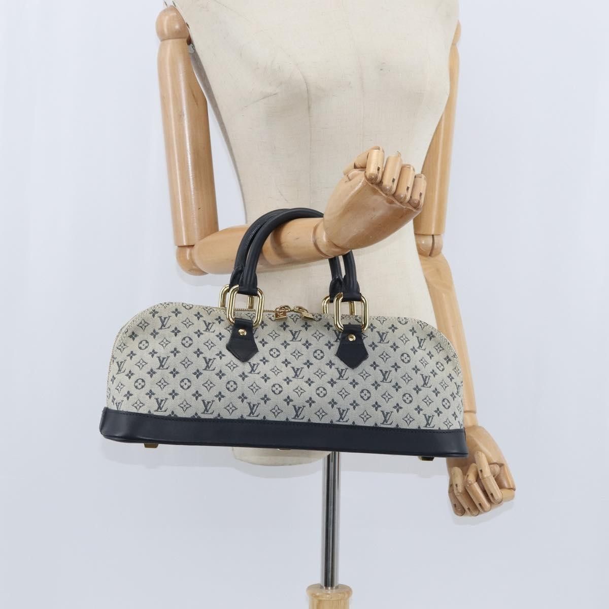 Louis Vuitton Louis Vuitton Alma Handbag Mini Lin Size ONE SIZE - 14 Thumbnail