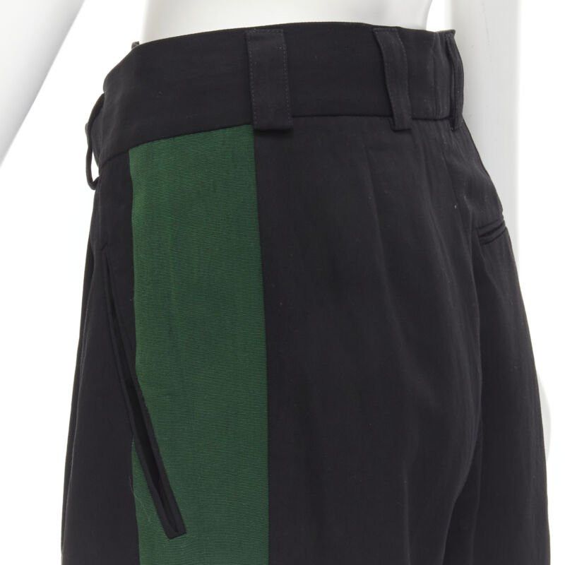 Haider Ackermann HAIDER ACKERMANN black green grosgrain trimmed side pleated front shorts FR34 XS Size 25" / US 0 / IT 36 - 7 Thumbnail