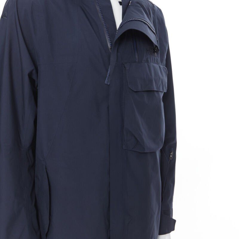 The North Face THE NORTH FACE GORE TEX blue asymmetric zip patch pocket hood windbreaker M / L Size US M / EU 48-50 / 2 - 10 Thumbnail