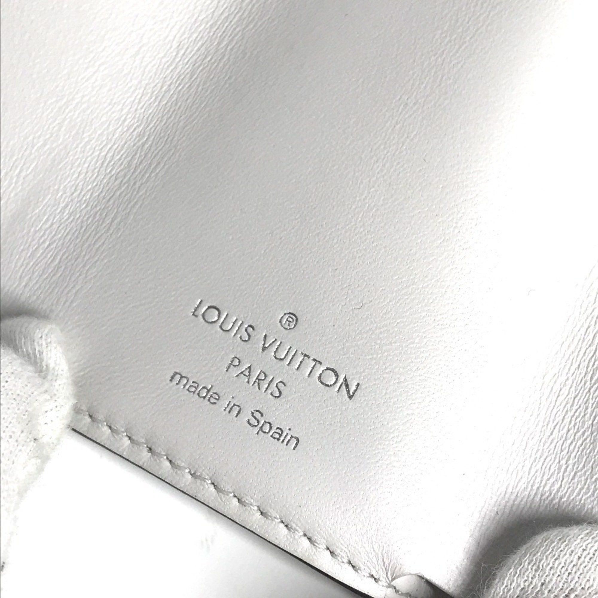 Louis Vuitton LOUIS VUITTON M67621 Taiga Rama Discovery Compact Wallet, a tri-fold wallet in leather and Monogram canvas, unisex, Blanc white. Size ONE SIZE - 10 Thumbnail