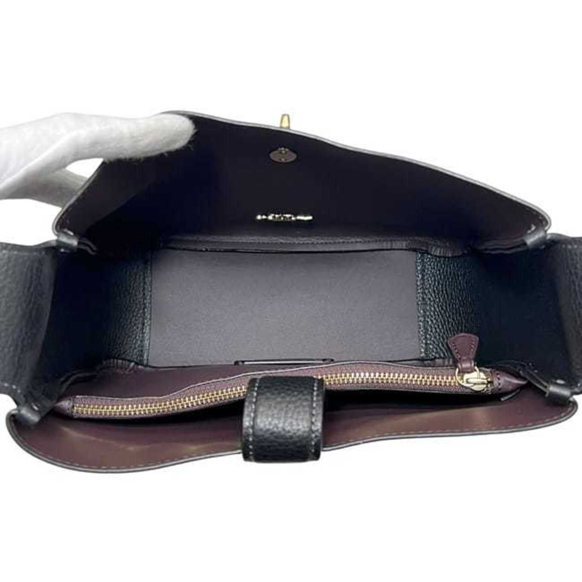 Coach Coach Hadley Convertible Crossbody Bag (f-24336) in Black (CW002) IMBLK Leather. This black shoulder bag features a turnlock closure and is perfect for women. Size ONE SIZE - 5 Thumbnail