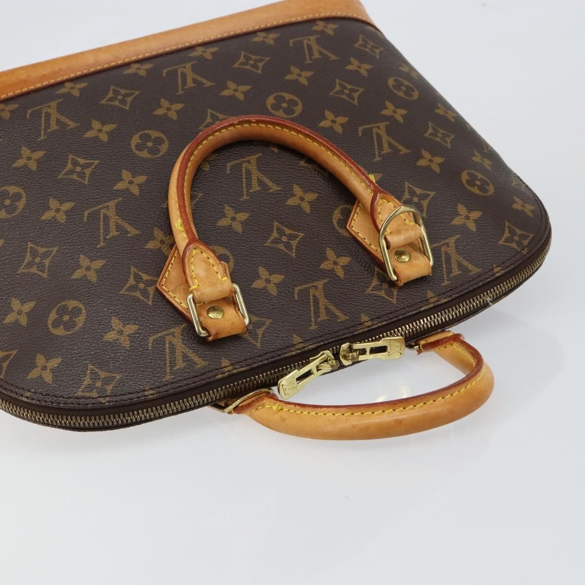 Louis Vuitton Louis Vuitton Alma Handbag Monogram Canvas Size ONE SIZE - 16 Thumbnail
